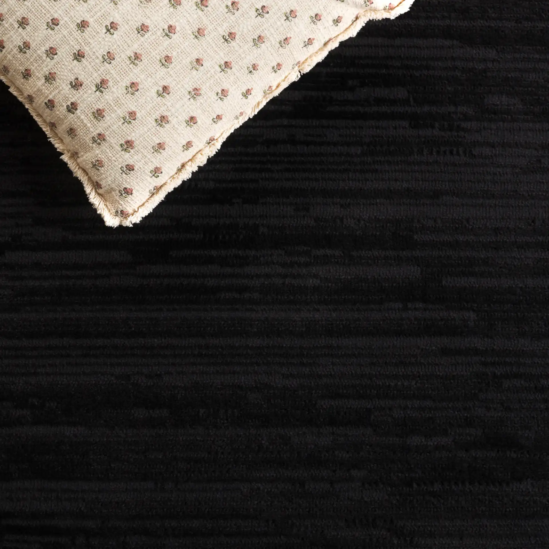 Mila Linear Stripe Rug in Beige / Black in a styled room