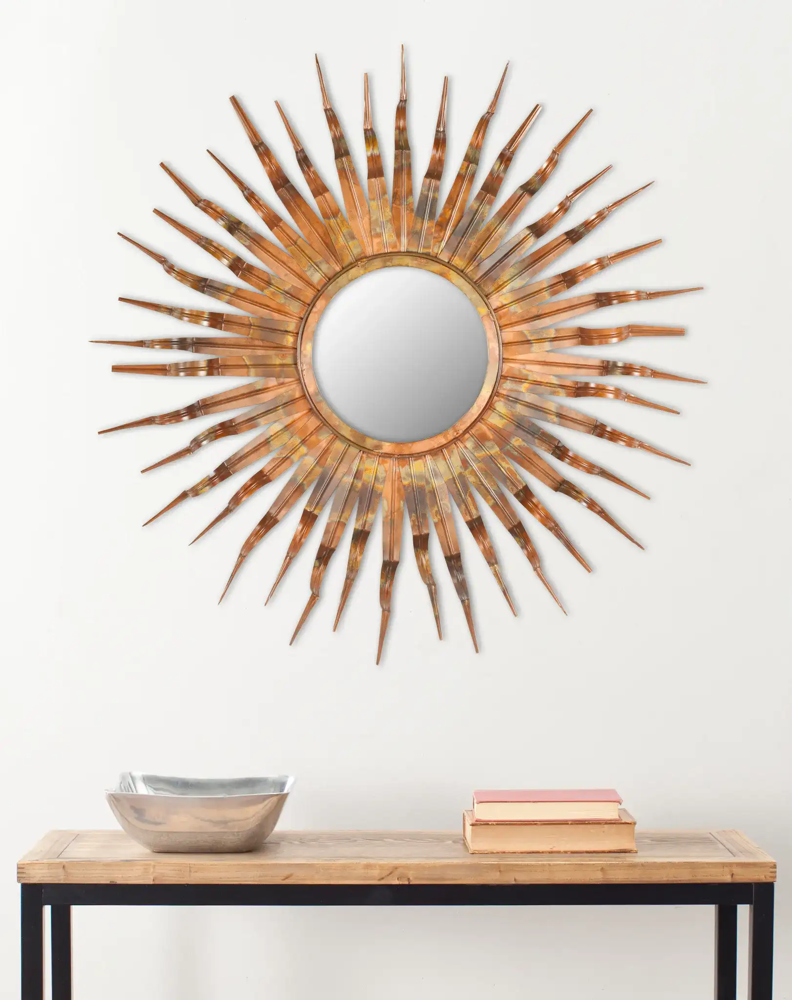 Sun Mirror in Burnt Copper in a styled room