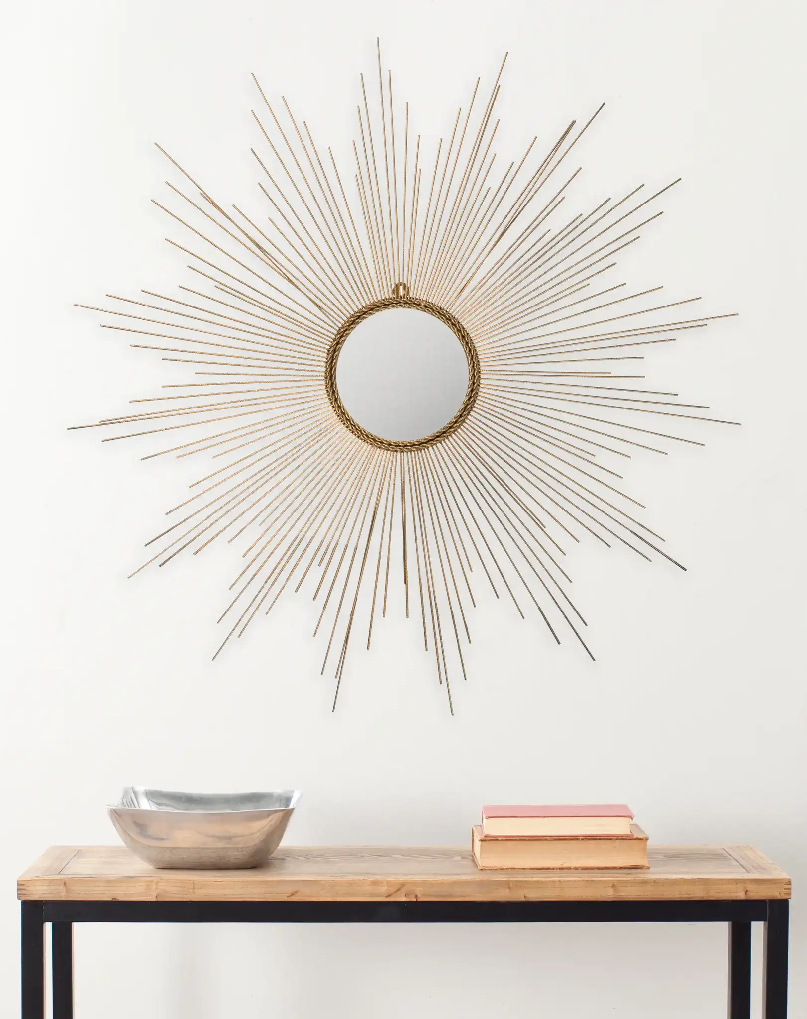 Marinda Mirror in Gold in a styled room