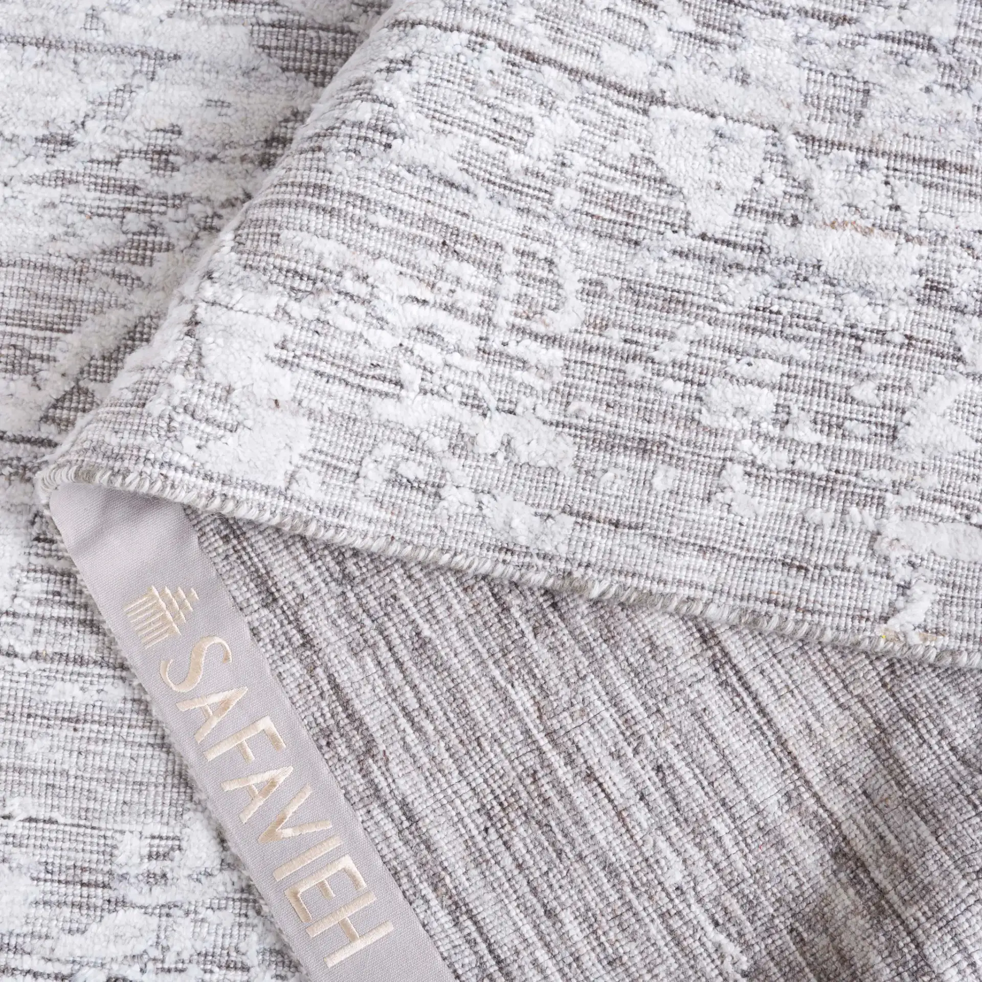 Mirage Abstract Crackle Hand-Loomed Rug in Ivory / Taupe in a styled room