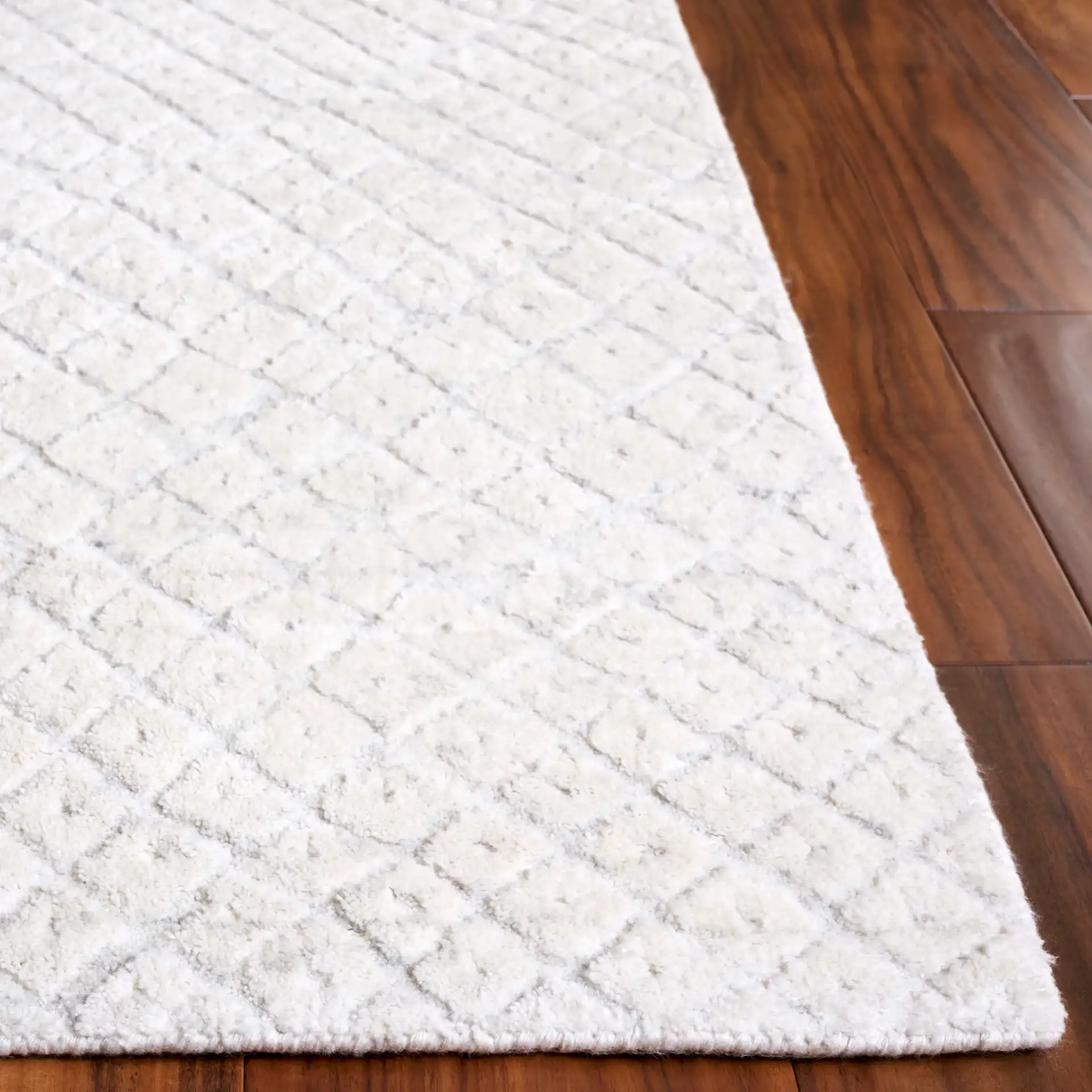 Mirage Micro-Diamond Hand-Loomed Rug in Ivory in a styled room