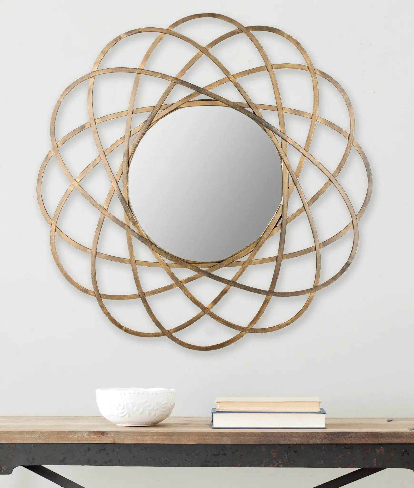 Galaxy Mirror in Antique Gold in a styled room