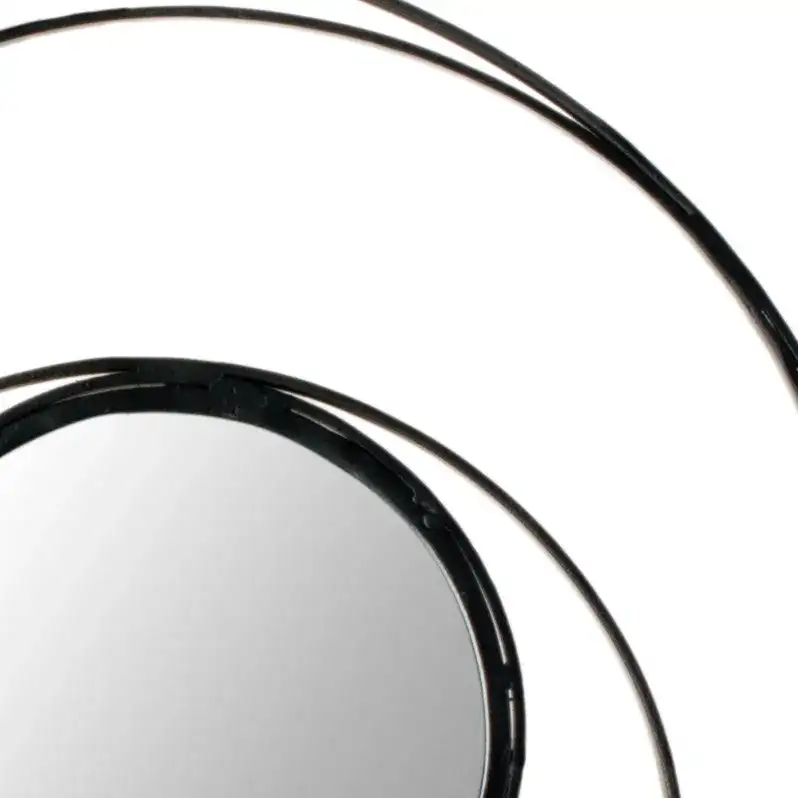 Ring Mirror in Black in a styled room