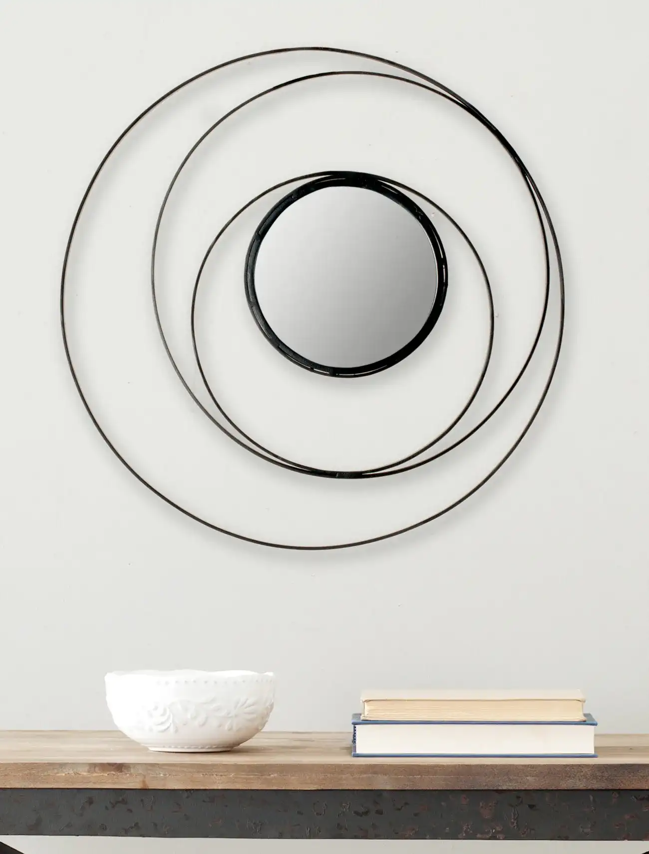 Ring Mirror in Black in a styled room
