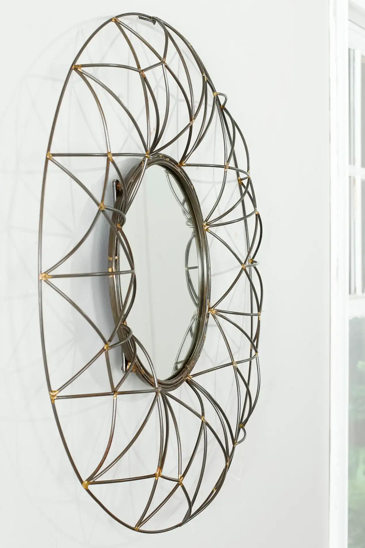 Round Mirror in Natural in a styled room