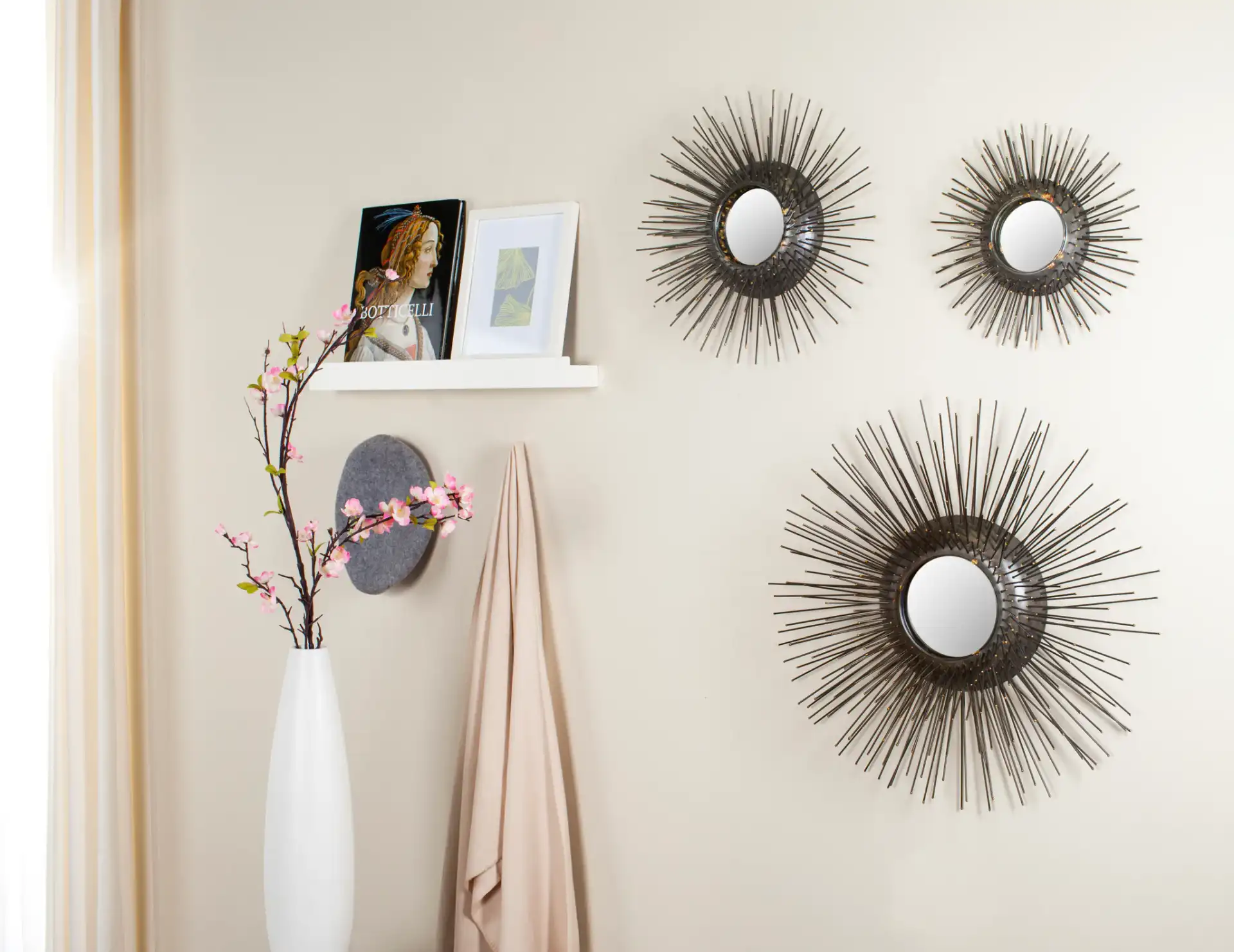 Sunburst Triptych Mirror Set (Set of 3) in Silver in a styled room