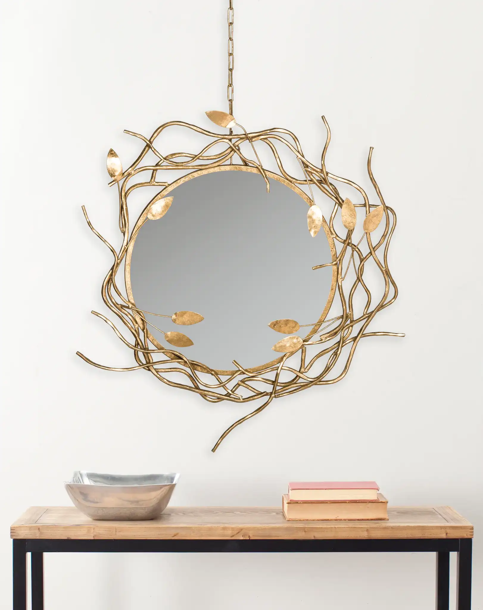 Gold Wreath Mirror in Antique Gold in a styled room