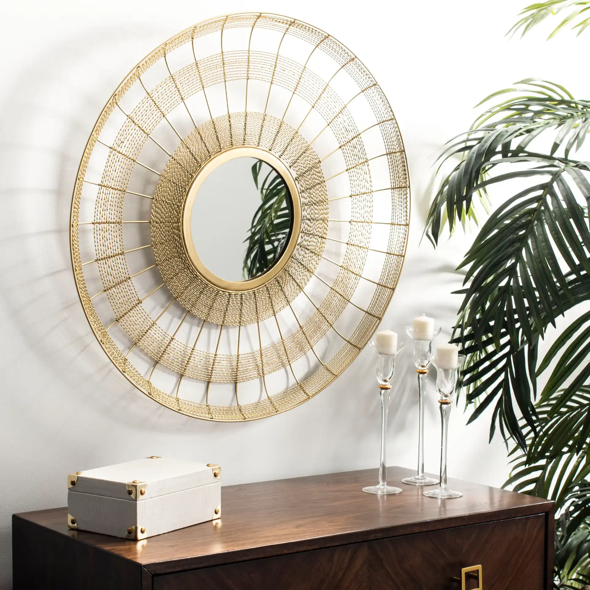Acton Mirror in Shiny Brass Finish in a styled room