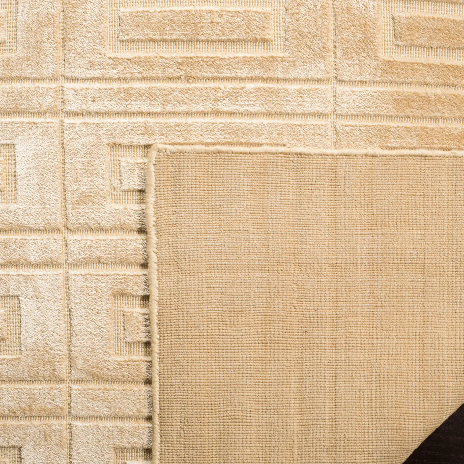 Mirage Rectangle Grid Hand-Loomed Rug in Champagne in a styled room