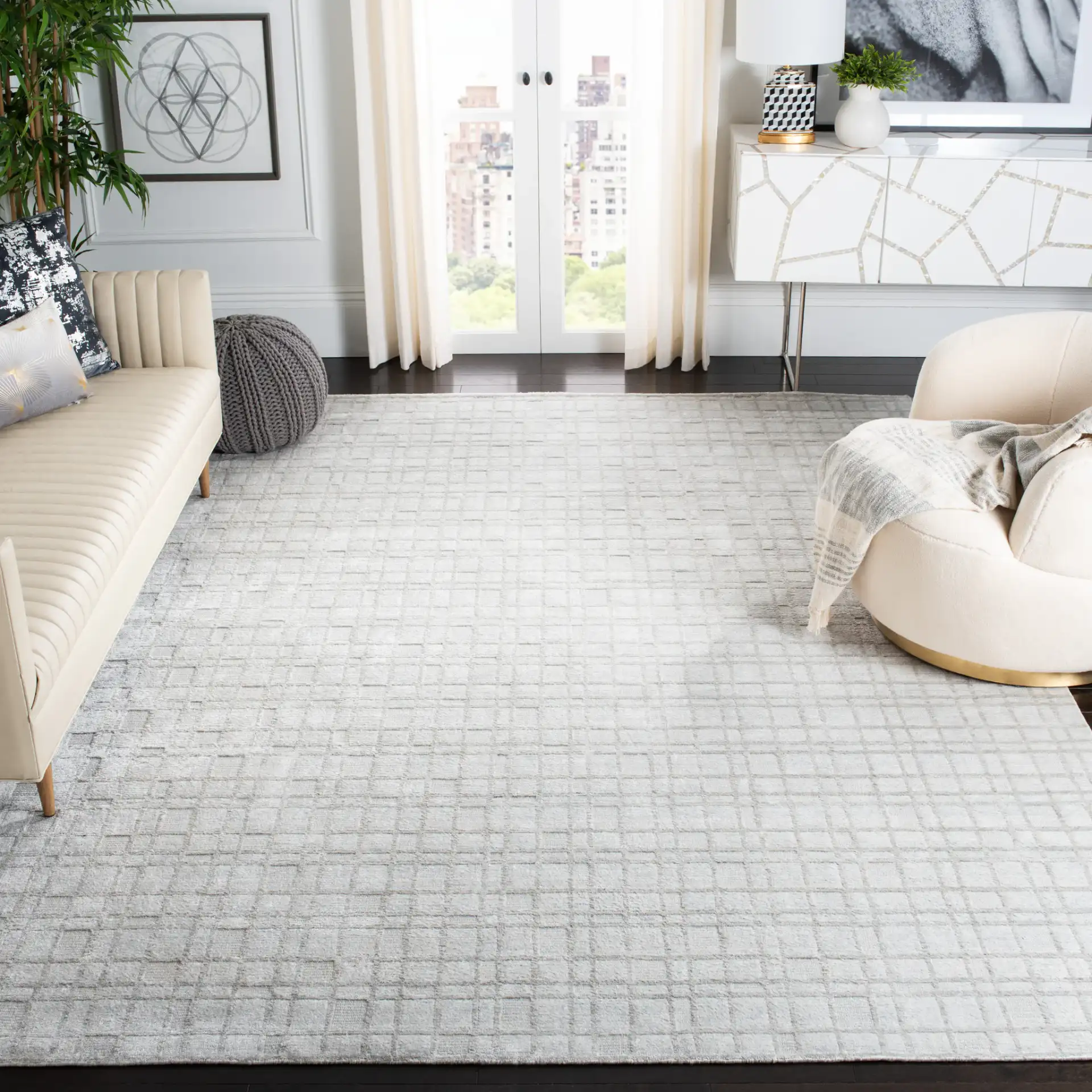 Mirage Grid Hand-Loomed Rug in Silver in a styled room