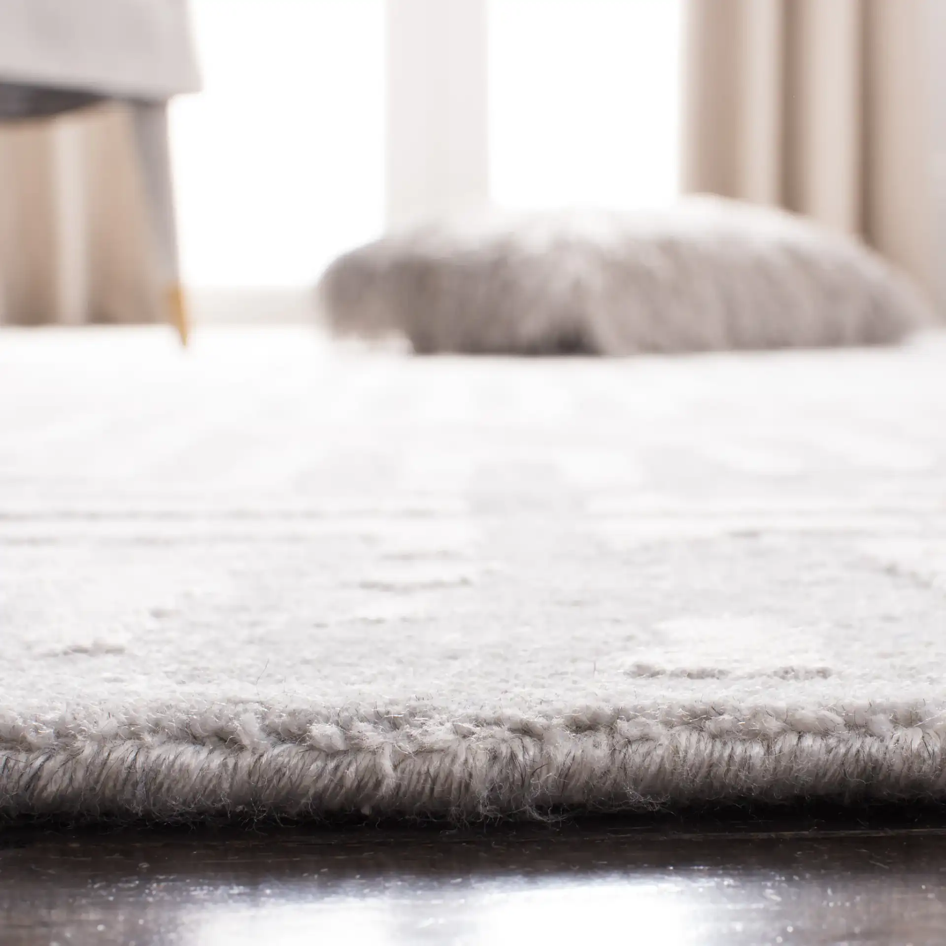 Mirage Maze Hand-Loomed Rug in Gray in a styled room