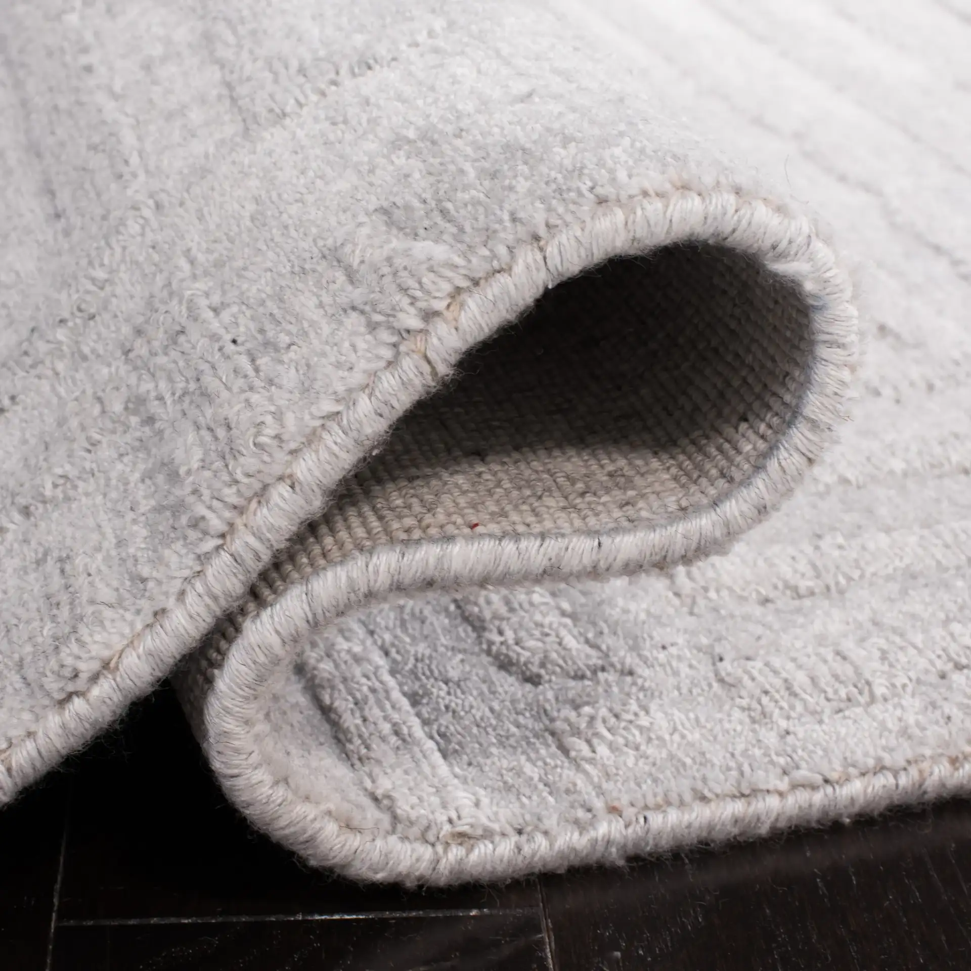 Mirage Maze Hand-Loomed Rug in Gray in a styled room