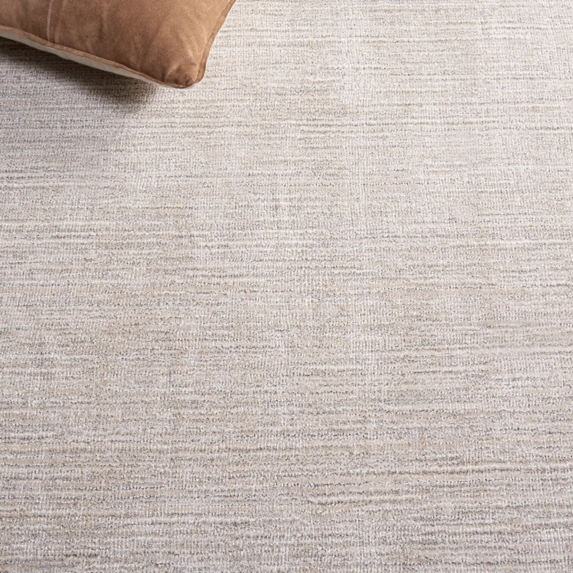 Mirage Textured Linear Hand-Loomed Rug in Beige in a styled room