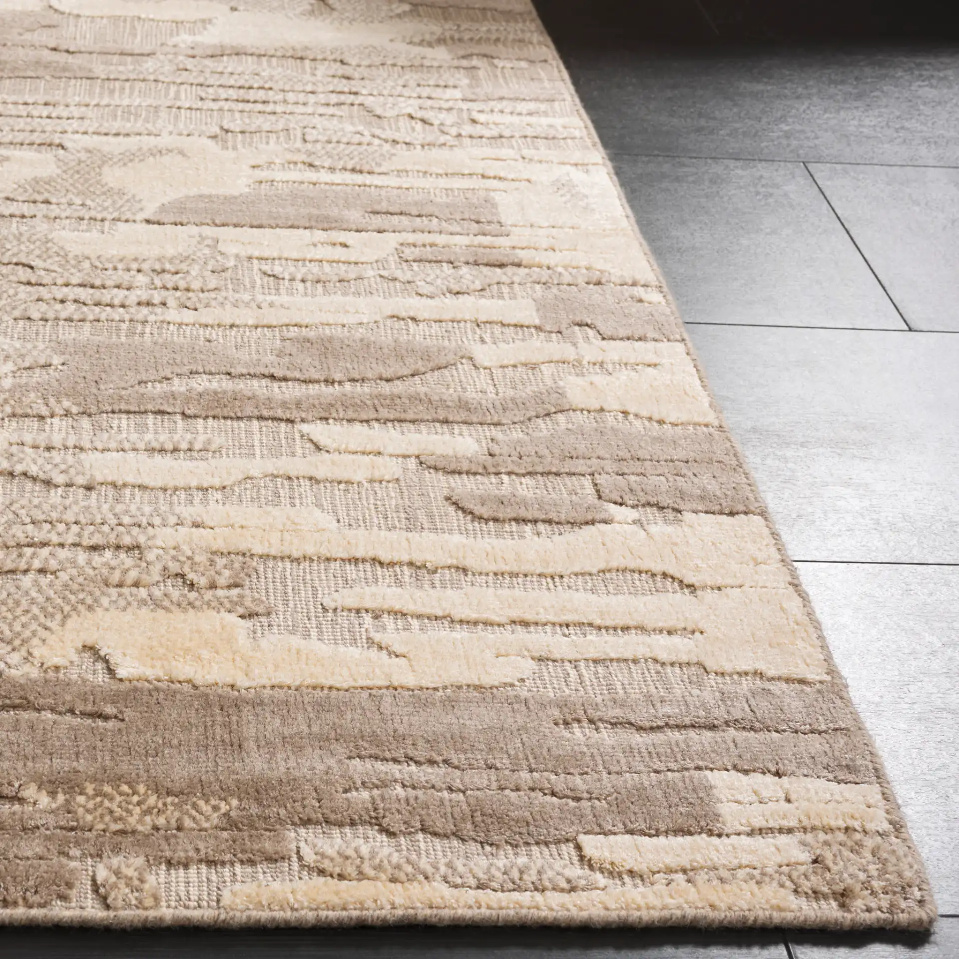 Mirage Abstract Stripe Hand-Loomed Rug in Brown / Gray in a styled room