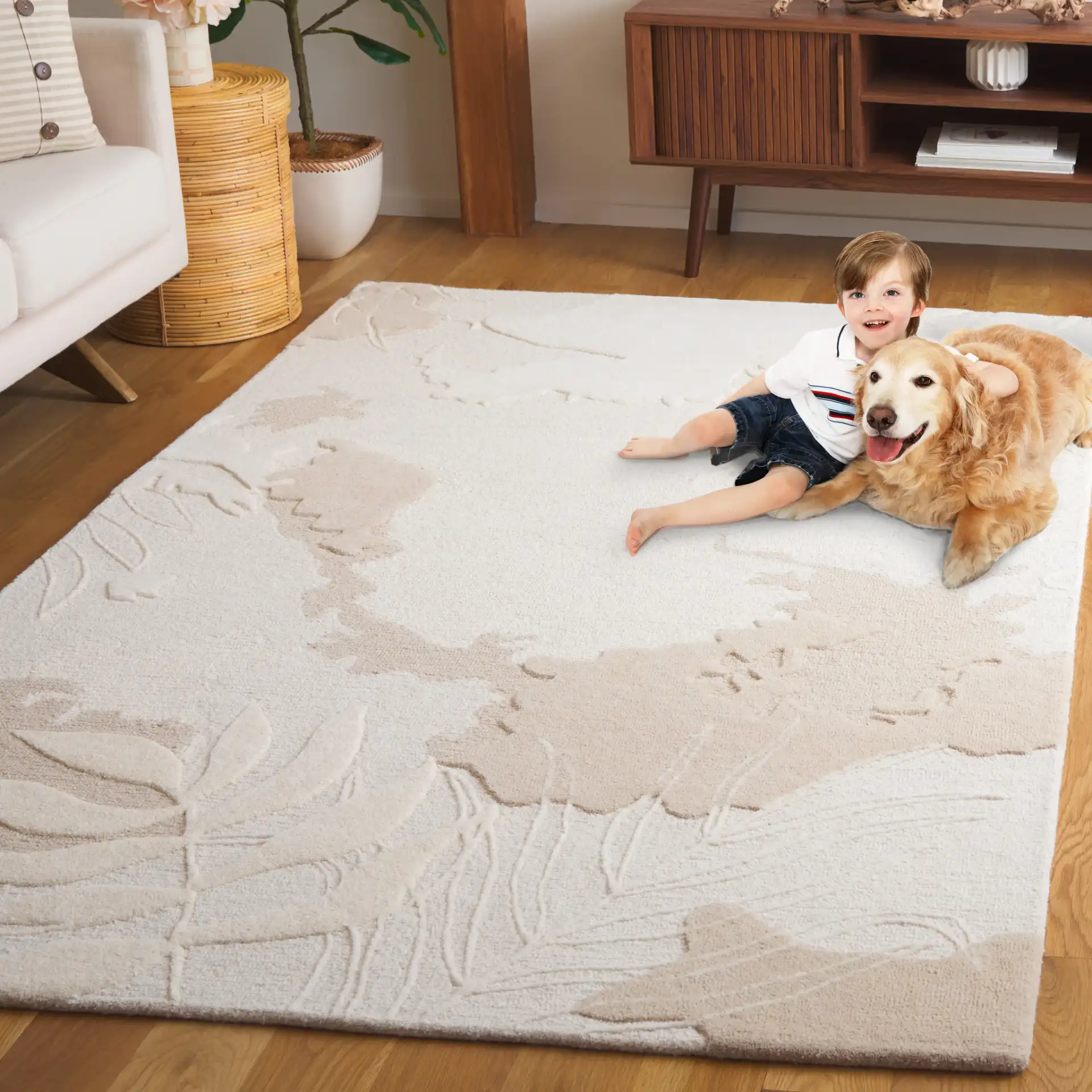 Mykonos Tropical Leaf Hand-Tufted Wool Rug in Ivory / Beige in a styled room