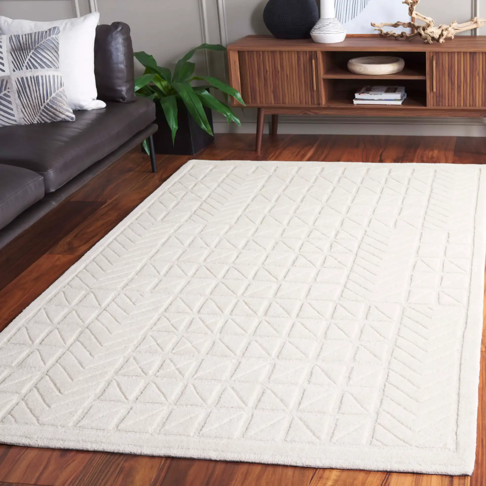 Mykonos Carved Geometric Hand-Tufted Wool Rug in Ivory in a styled room