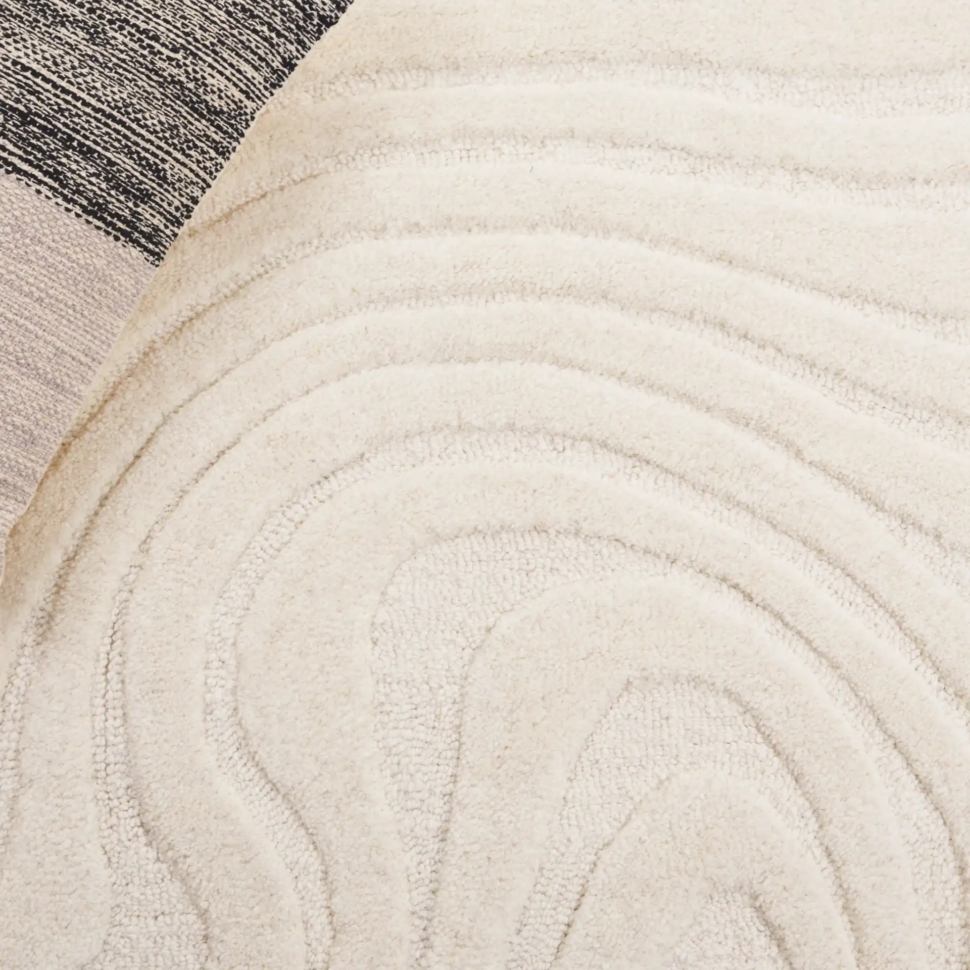 Mykonos Organic Wave Hand-Tufted Wool Rug in Ivory in a styled room