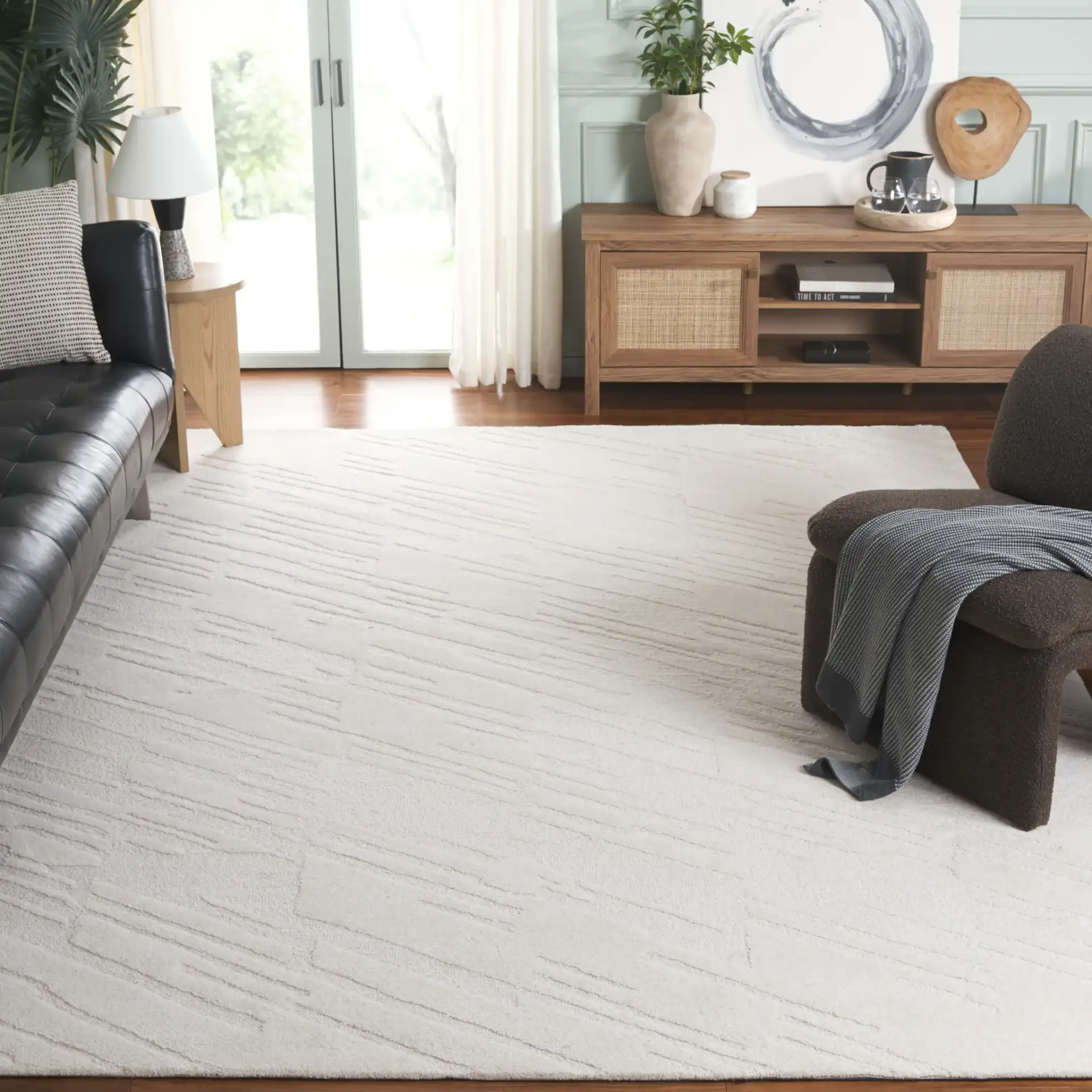 Mykonos Textured Stripe Hand-Tufted Wool Rug in Ivory in a styled room