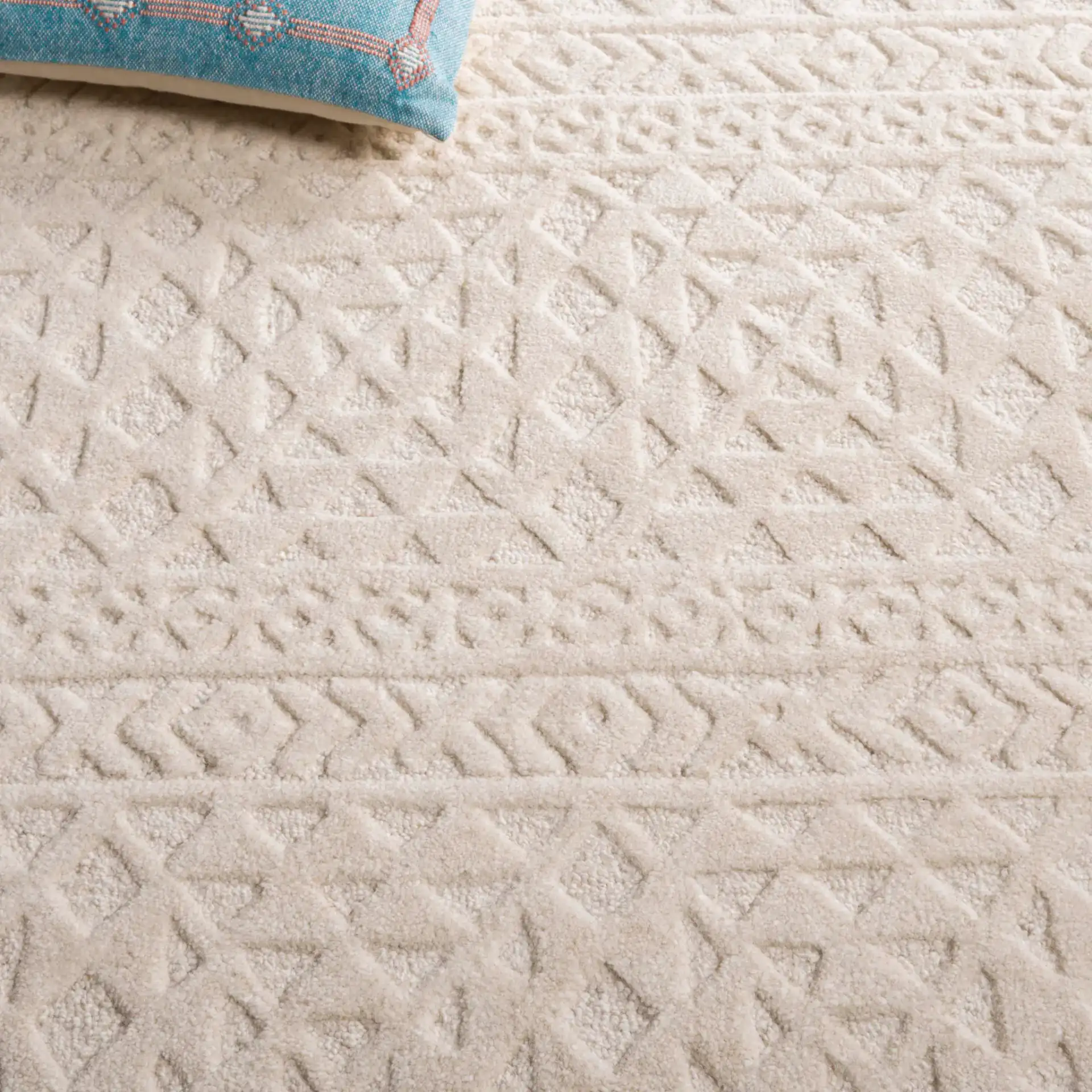 Mykonos Textured Diamond Hand-Tufted Wool Rug in Ivory in a styled room