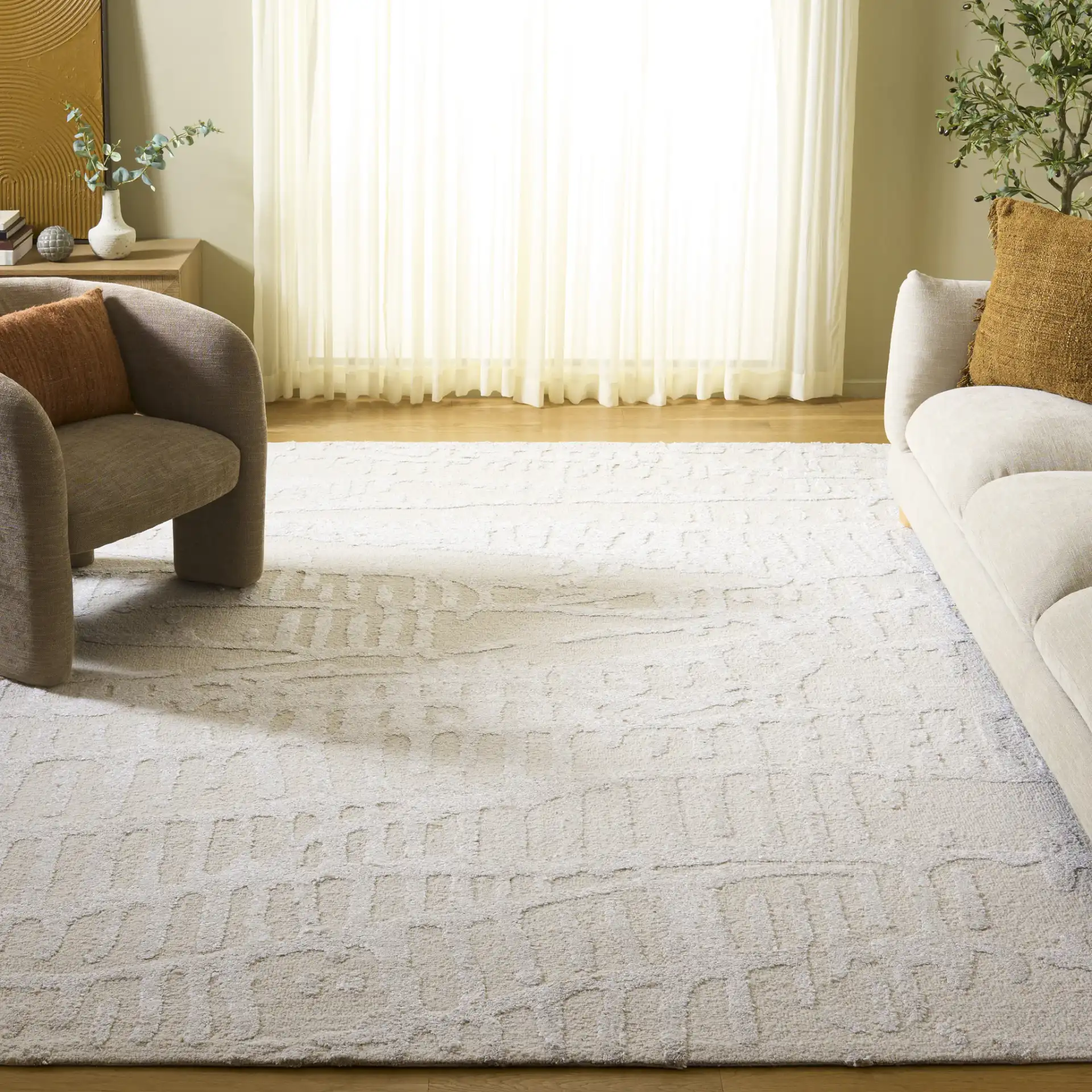 Mykonos Textured Abstract Hand-Tufted Rug in Ivory / Beige in a styled room