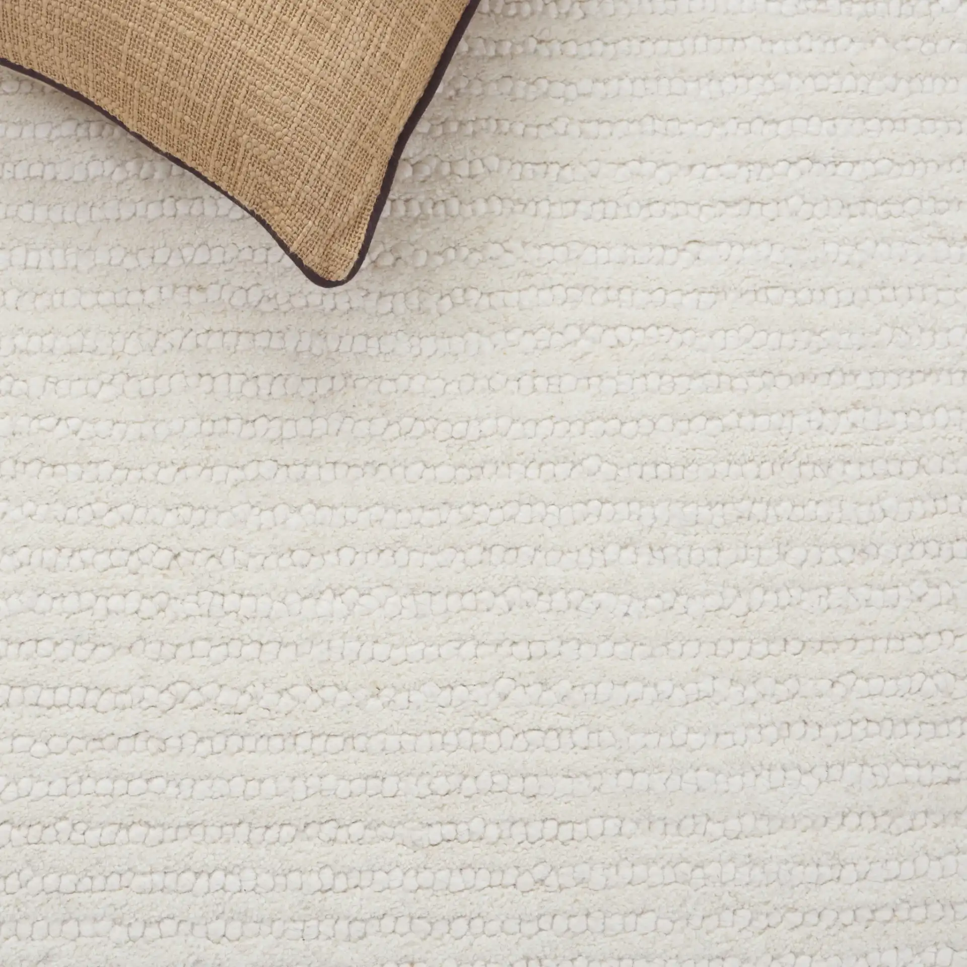Mykonos Stepped Border Hand-Tufted Wool Rug in Ivory in a styled room