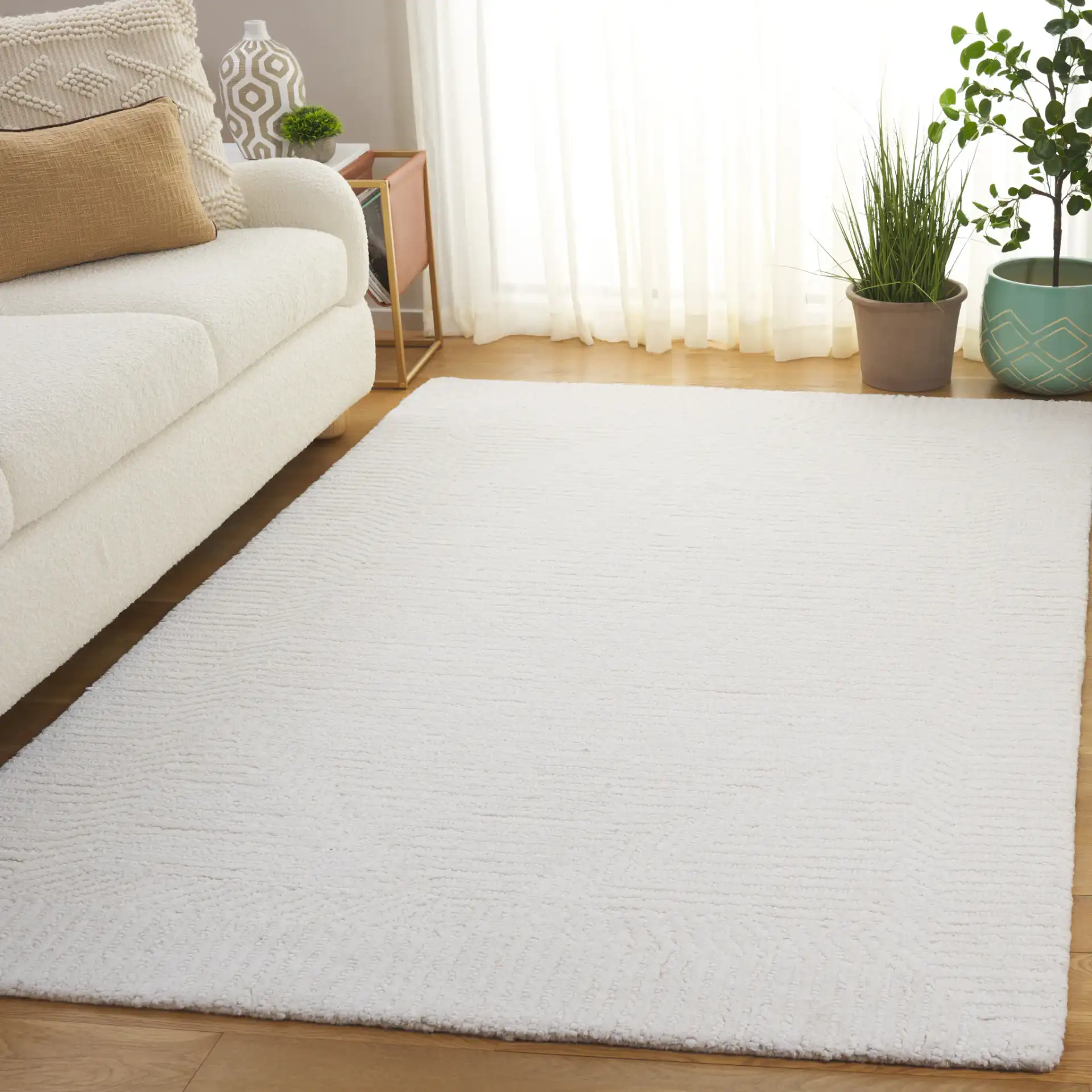Mykonos Stepped Border Hand-Tufted Wool Rug in Ivory in a styled room