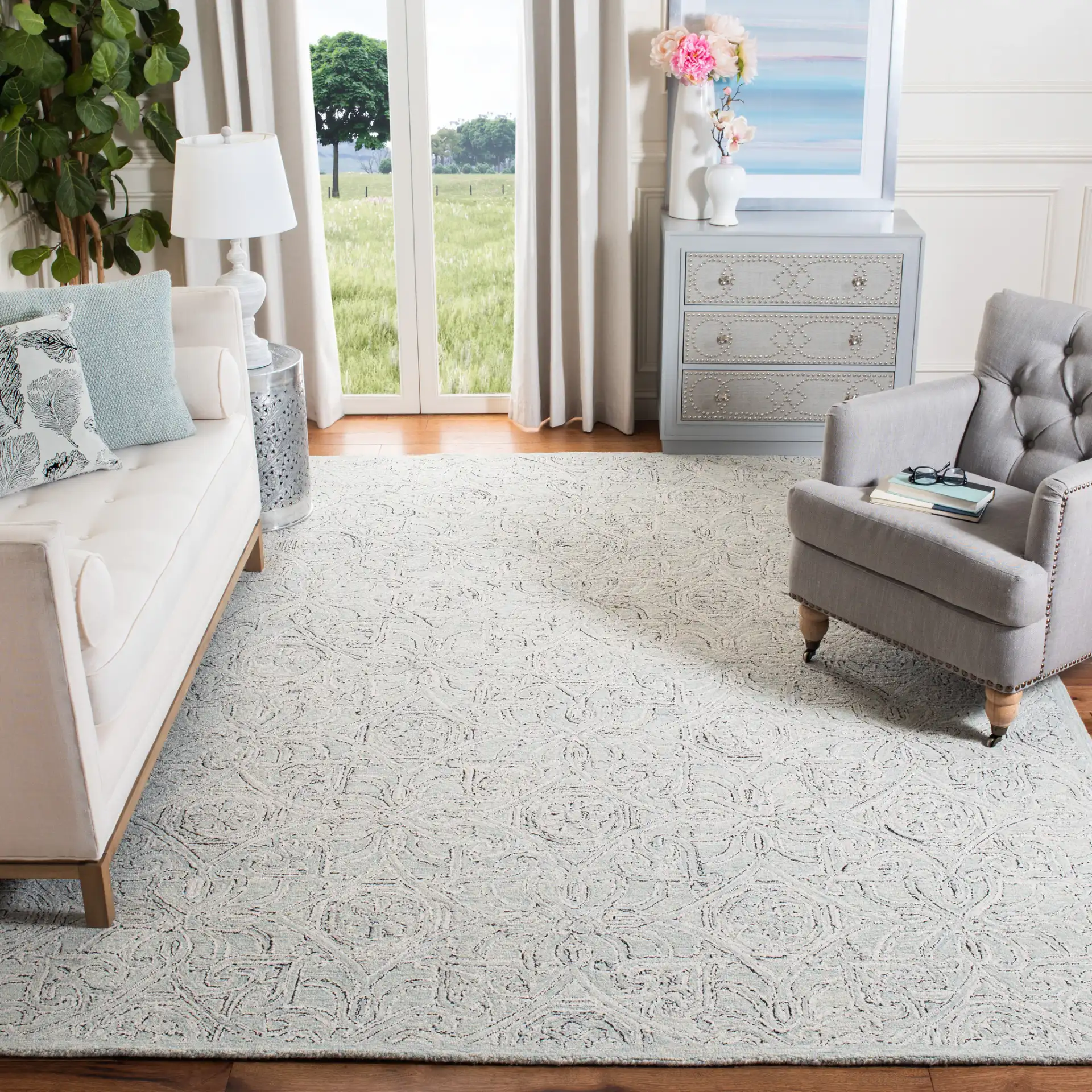 Micro-Loop Arabesque Tile Hand-Tufted Wool Rug in Gray / Ivory in a styled room