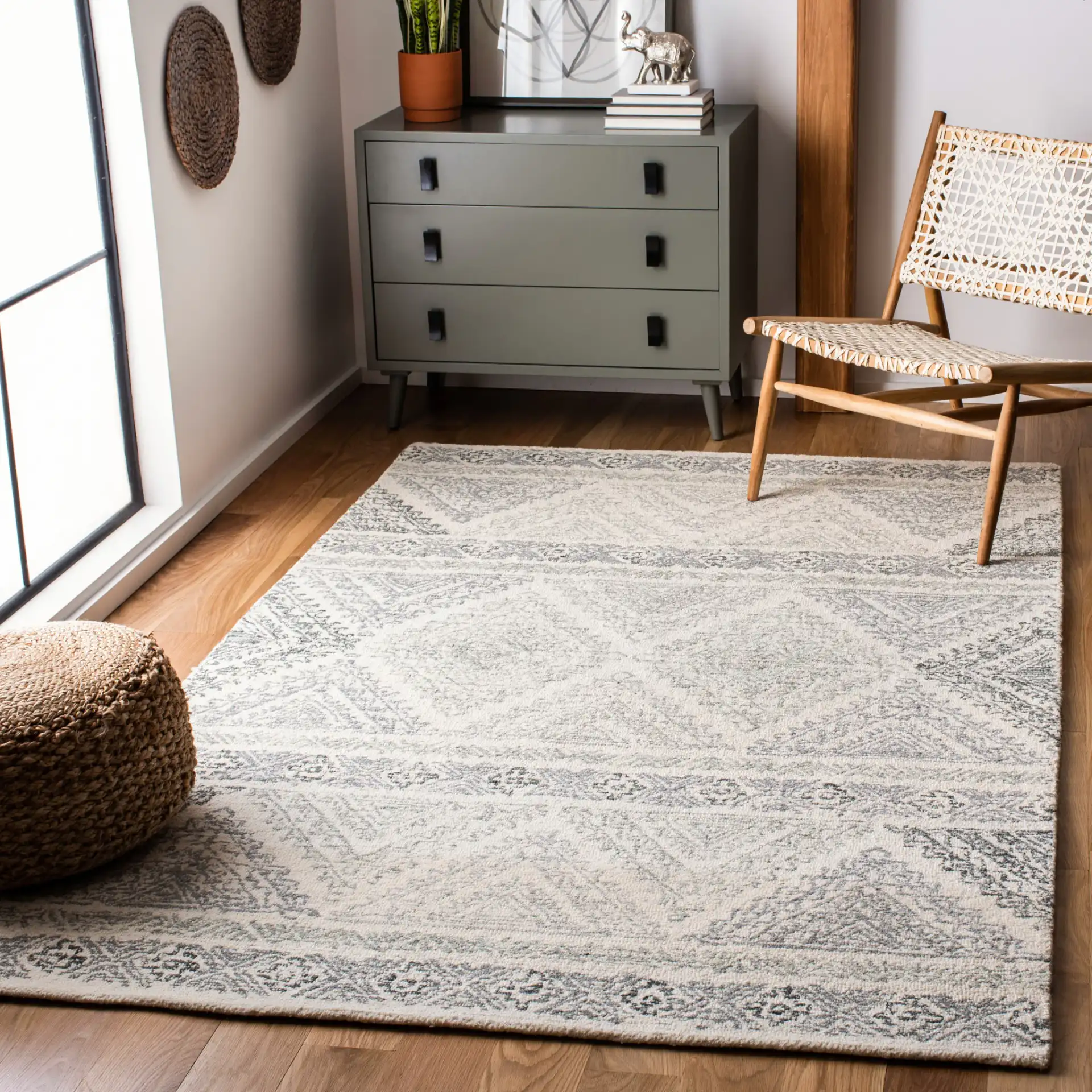 Micro-Loop Banded Geometric Hand-Tufted Rug in Ivory / Gray in a styled room