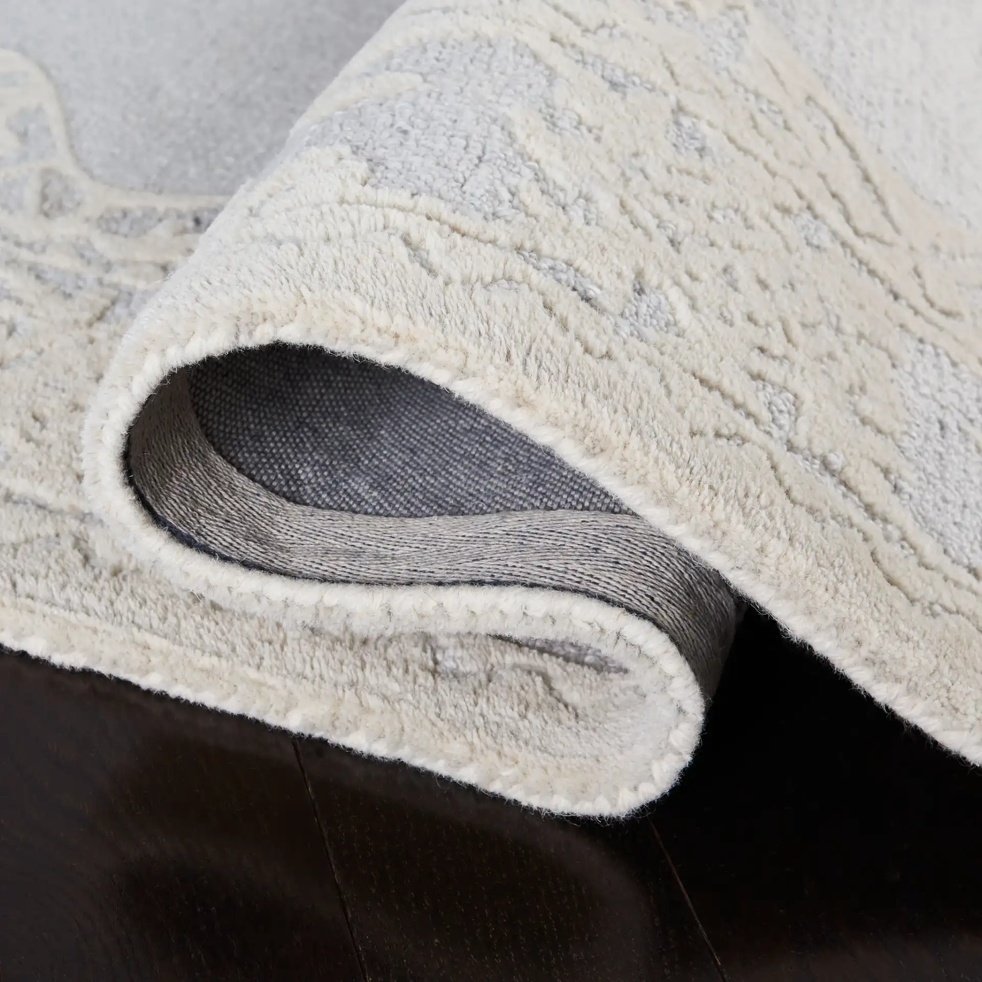 Micro-Loop Medallion Hand-Tufted Wool Rug in Ivory / Gray in a styled room