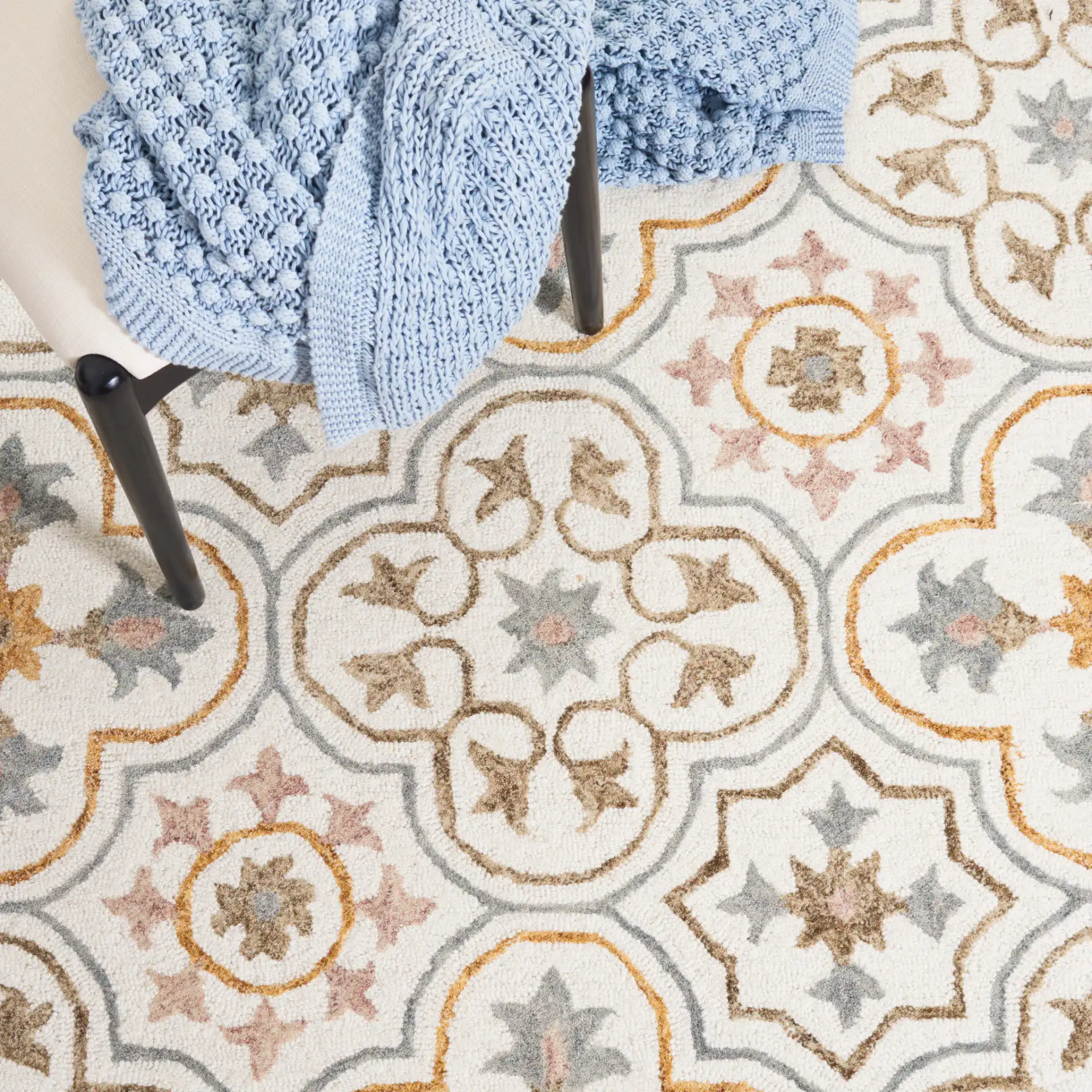 Micro-Loop Star Tile Hand-Tufted Wool Rug in Ivory / Gray in a styled room