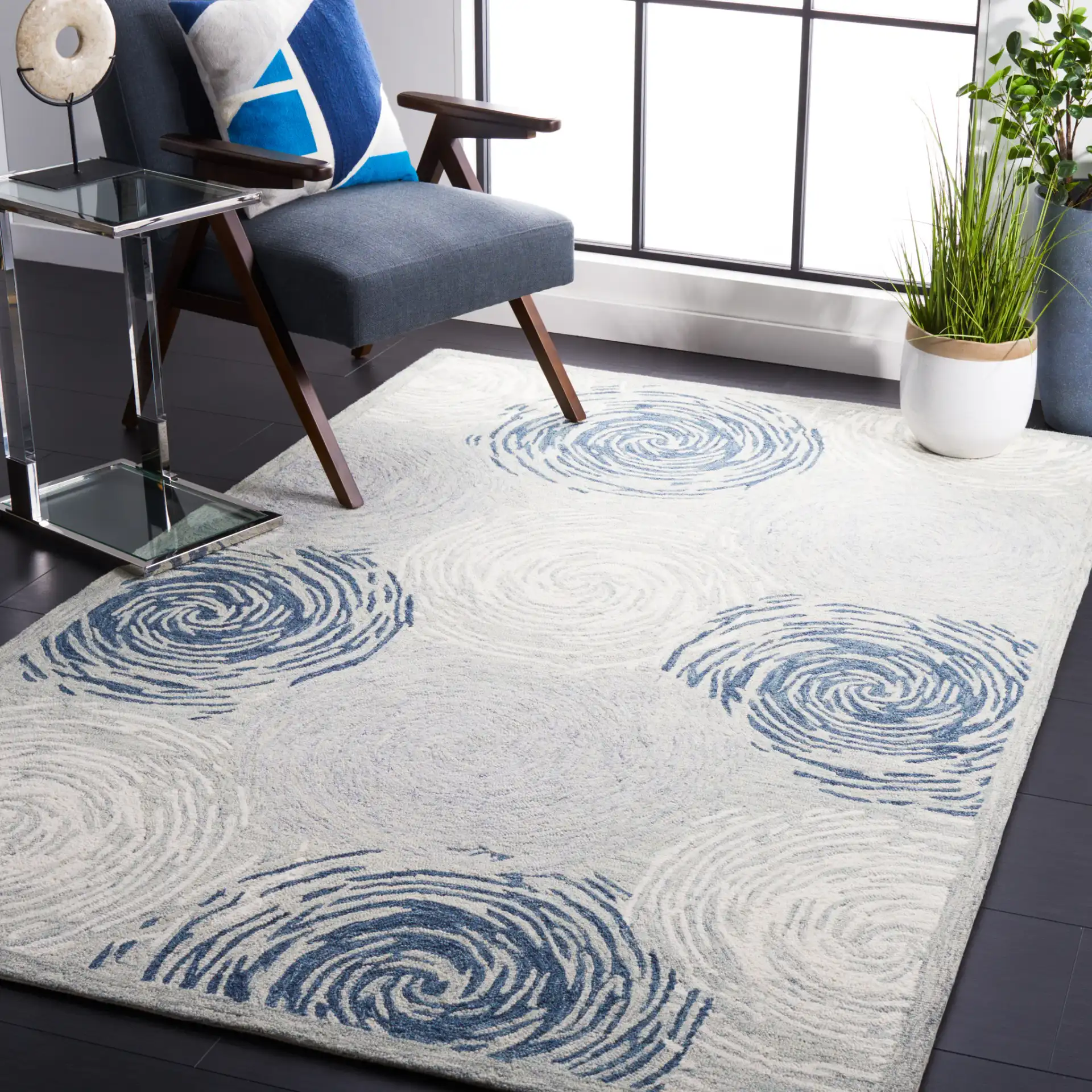 Micro-Loop Swirling Circles Hand-Tufted Wool Rug in Gray / Ivory in a styled room