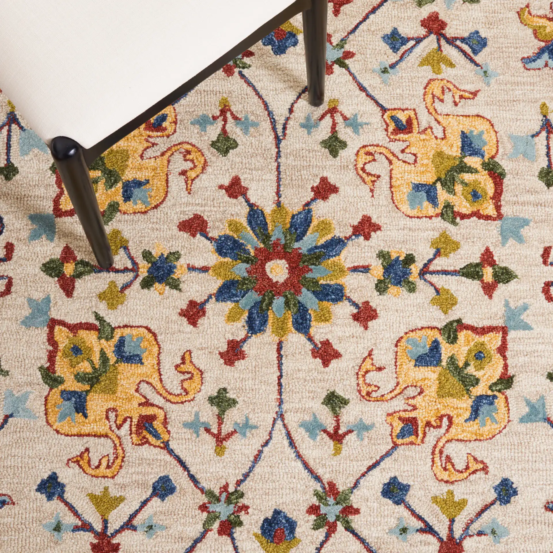 Micro-Loop Bordered Floral Trellis Hand-Tufted Wool Rug in Beige / Rust in a styled room