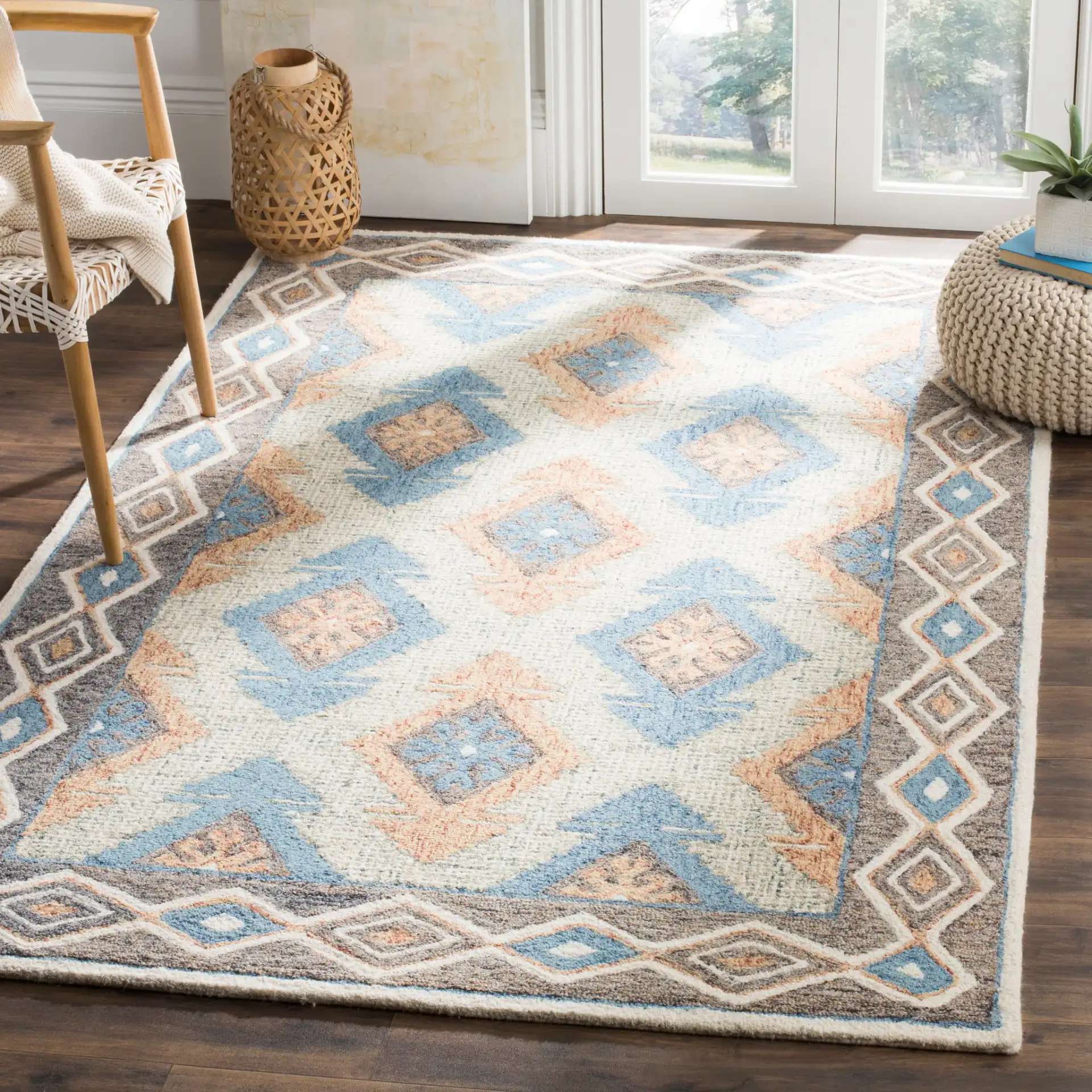 Micro-Loop Micro Loop Southwestern Diamond Hand-Tufted Wool Rug in Blue / Beige in a styled room