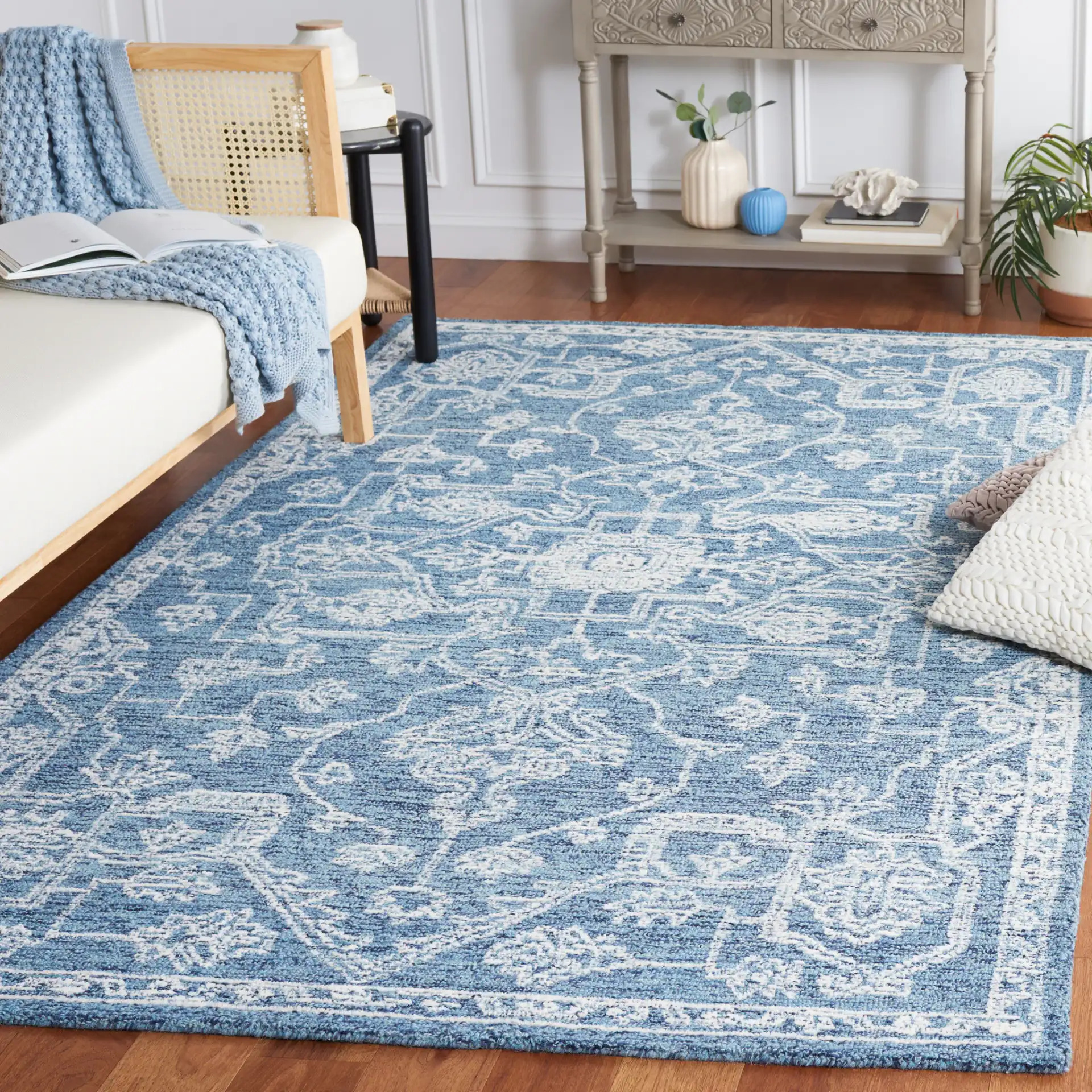 Micro-Loop Diamond Medallion Wool Rug in Blue / Ivory in a styled room