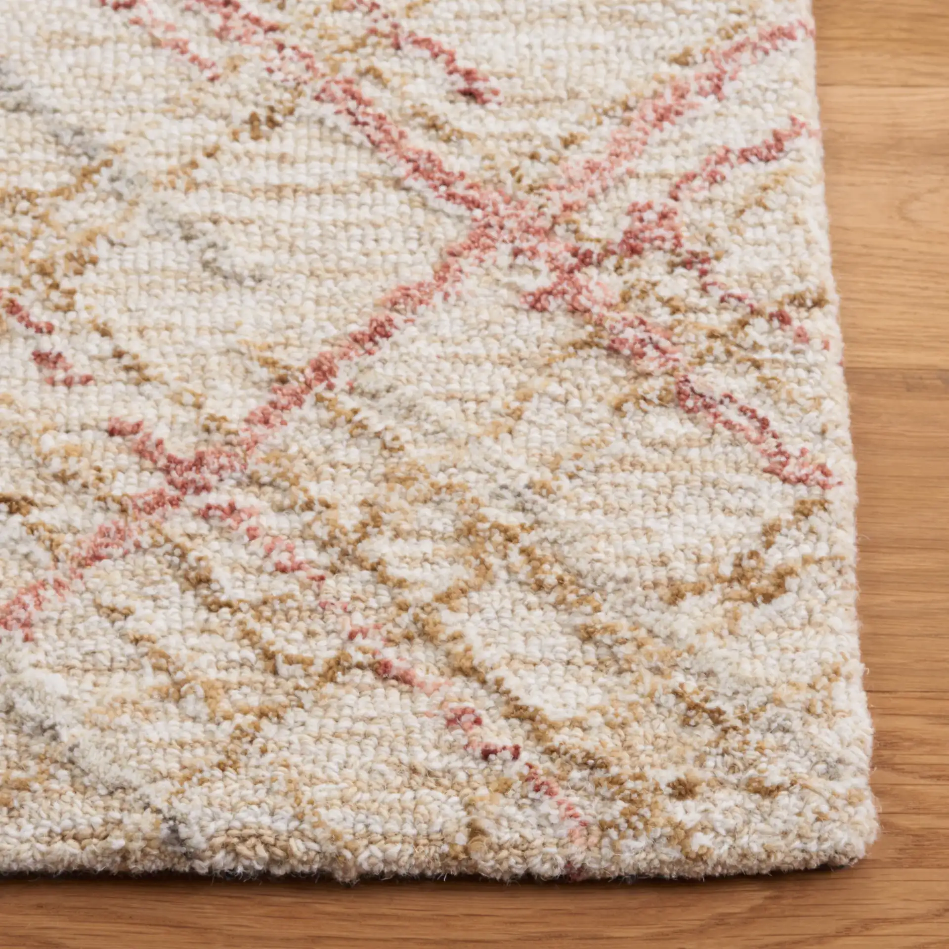 Micro-Loop Crosshatch Grid Hand-Tufted Wool Rug in Ivory / Red in a styled room