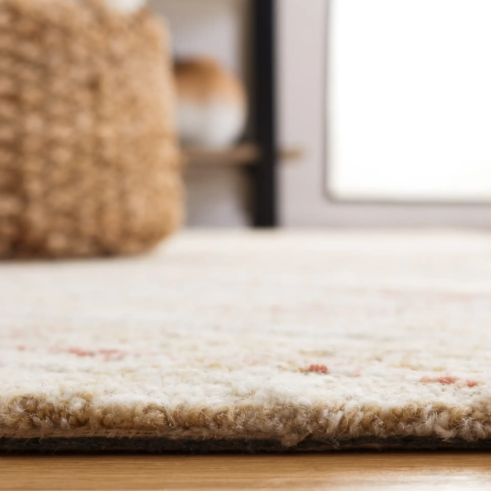 Micro-Loop Crosshatch Grid Hand-Tufted Wool Rug in Ivory / Red in a styled room