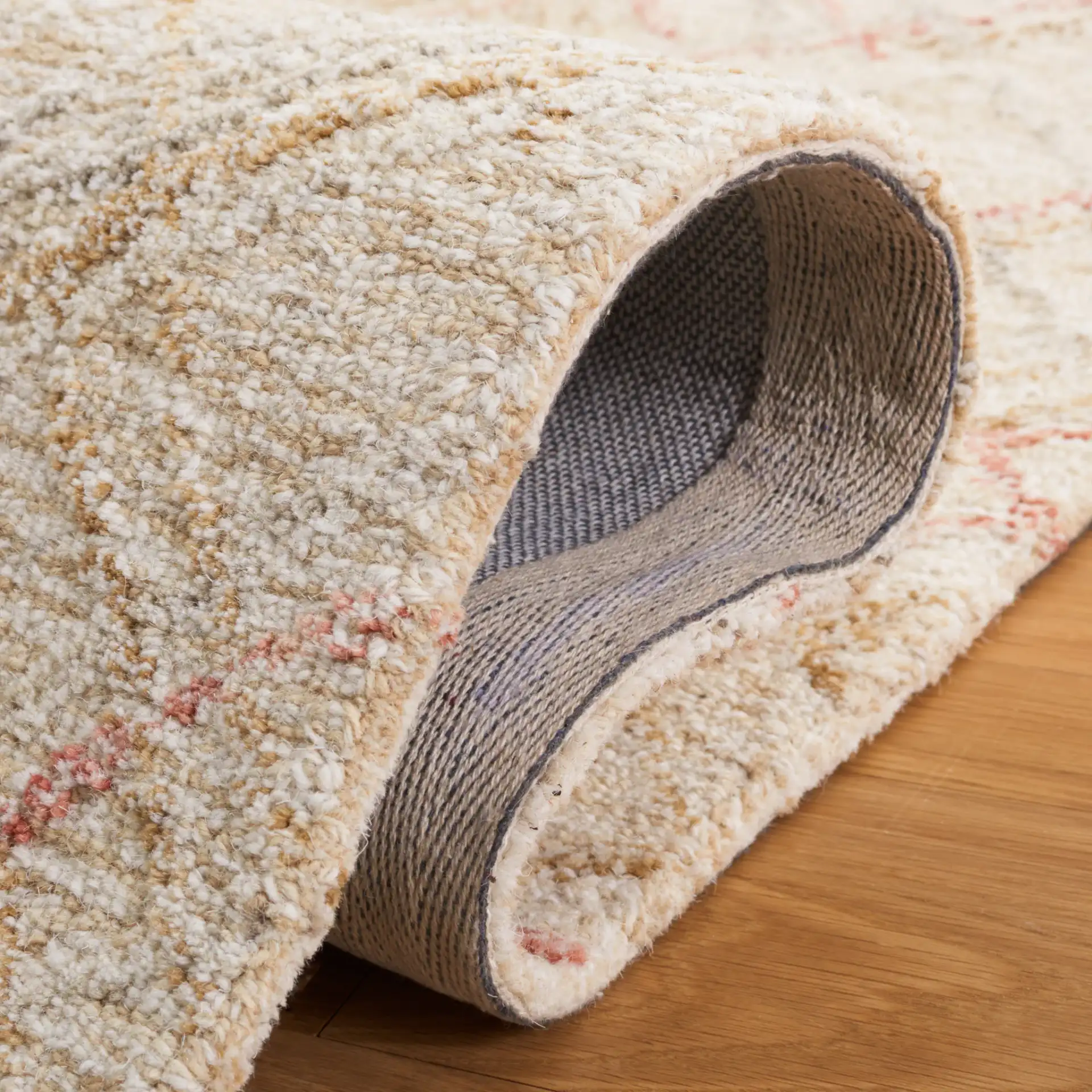 Micro-Loop Crosshatch Grid Hand-Tufted Wool Rug in Ivory / Red in a styled room