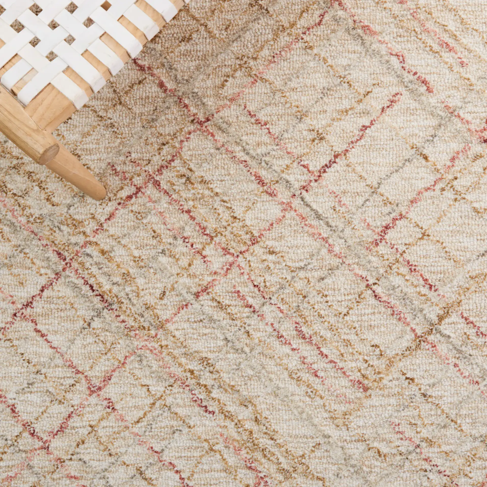 Micro-Loop Crosshatch Grid Hand-Tufted Wool Rug in Ivory / Red in a styled room