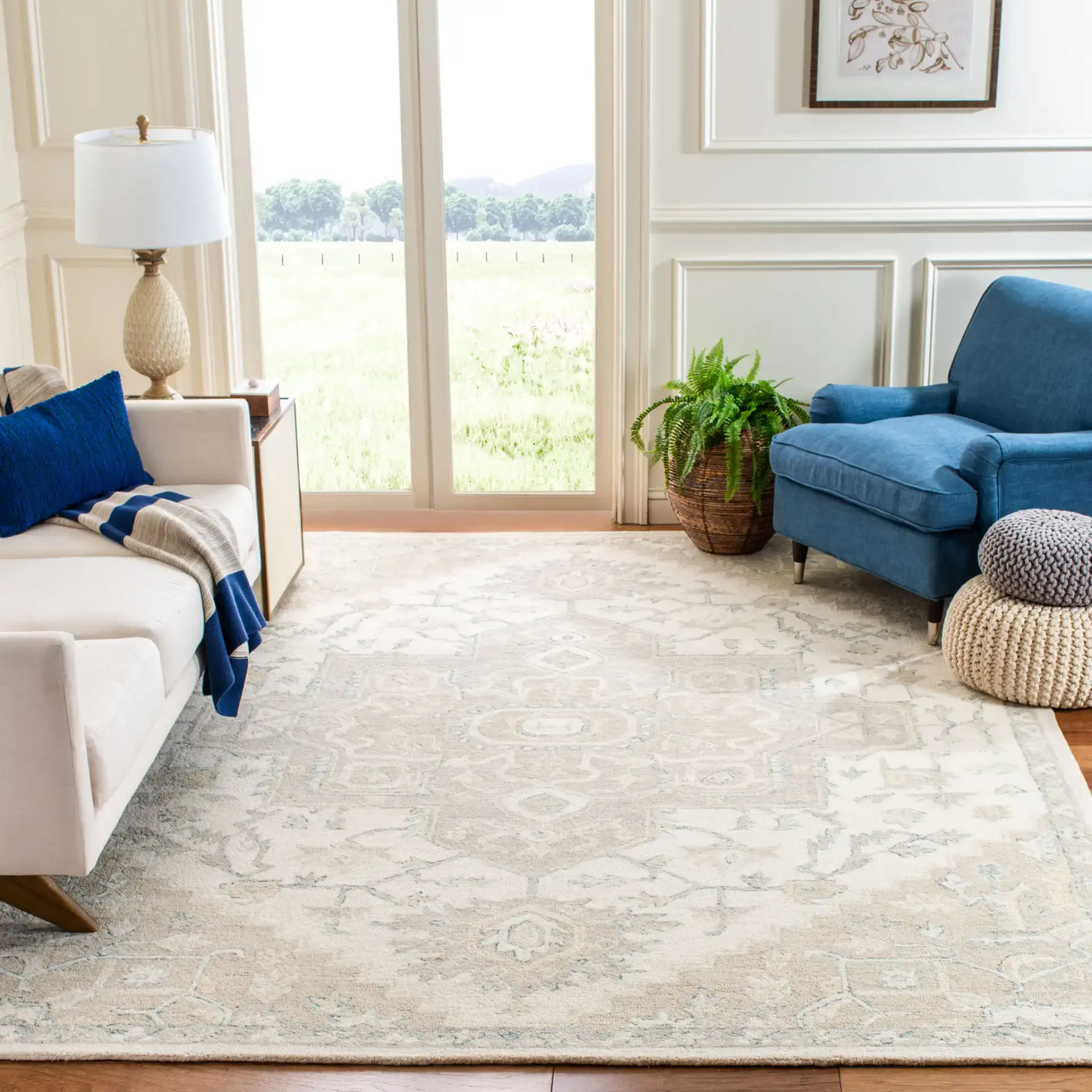 Micro-Loop Micro Loop Stepped Medallion Hand-Tufted Wool Rug in Ivory / Beige in a styled room