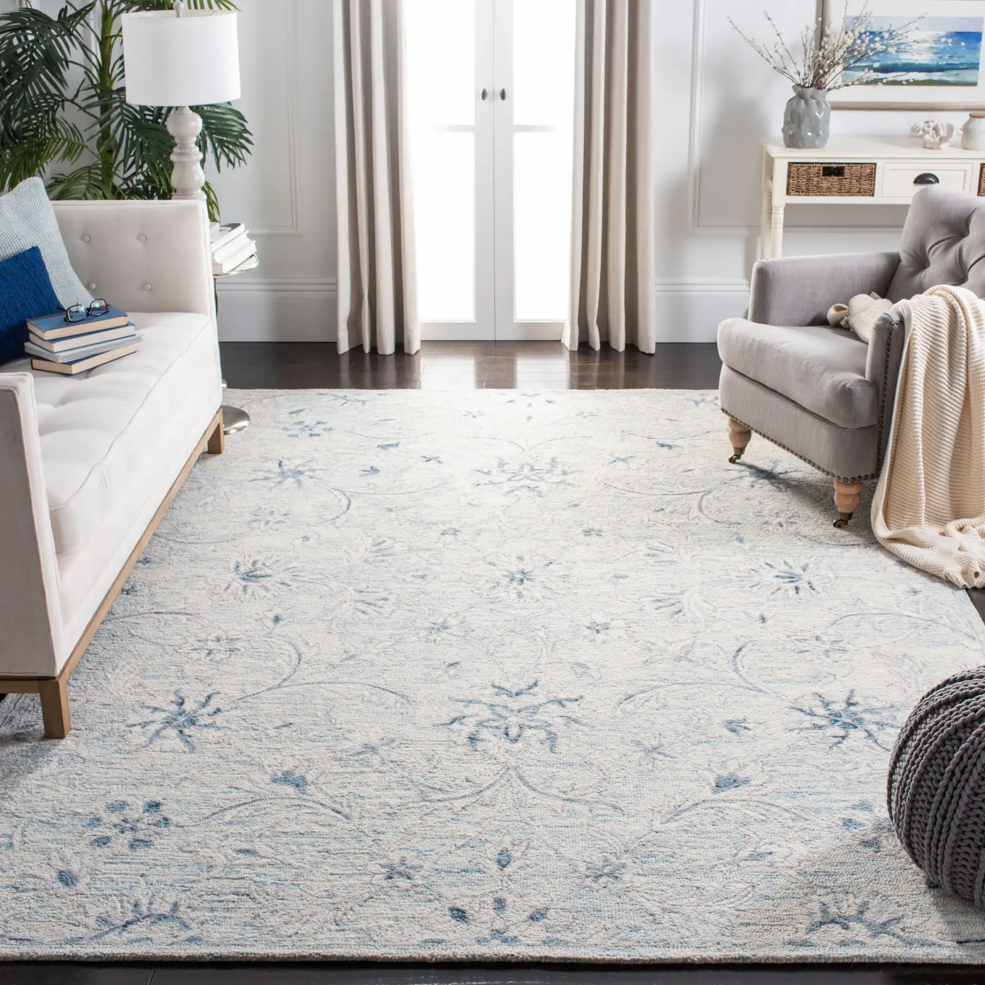 Micro-Loop Micro Loop Scrolling Floral Hand-Tufted Wool Rug in Light Blue / Ivory in a styled room