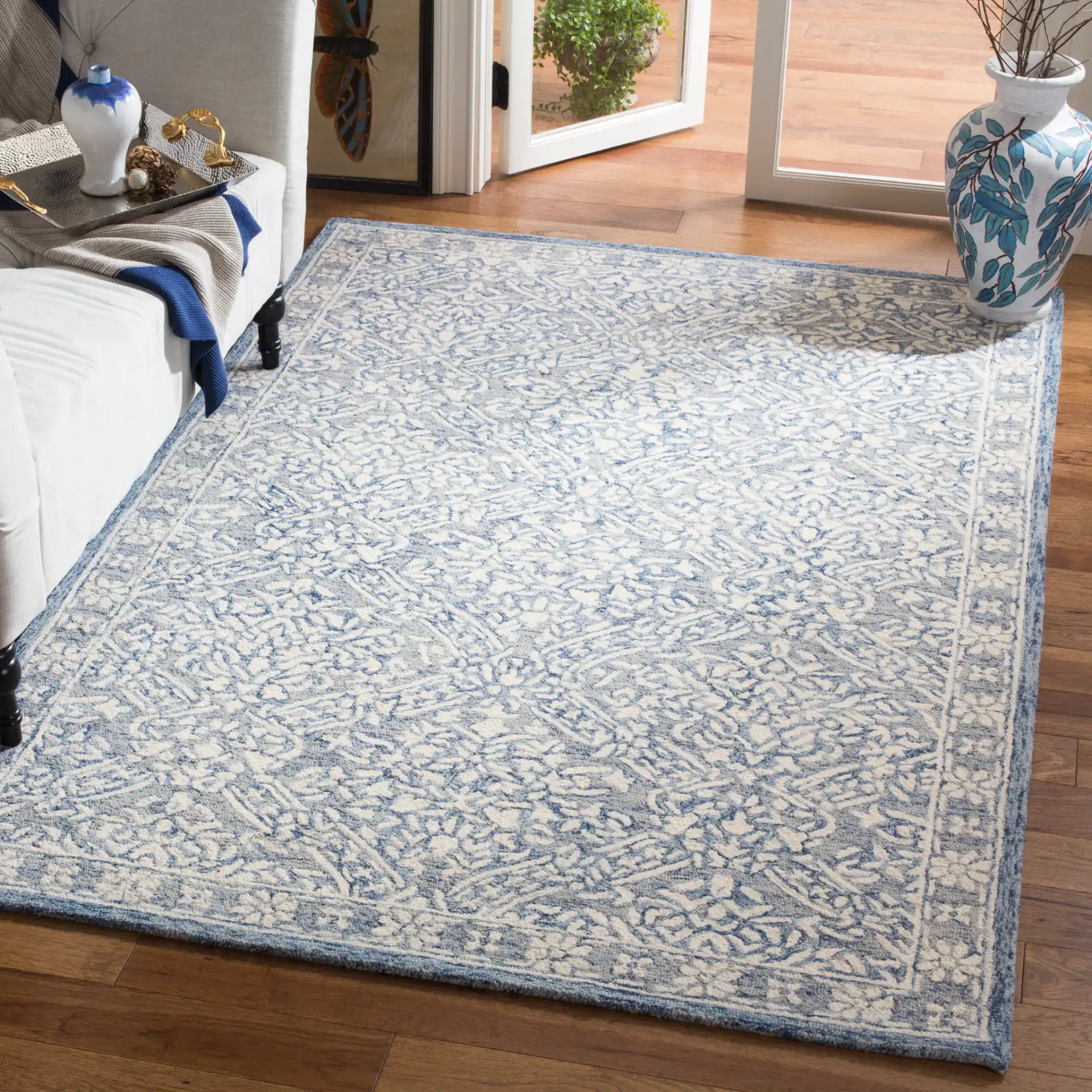 Micro-Loop Damask Trellis Hand-Tufted Wool Rug in Blue / Ivory in a styled room