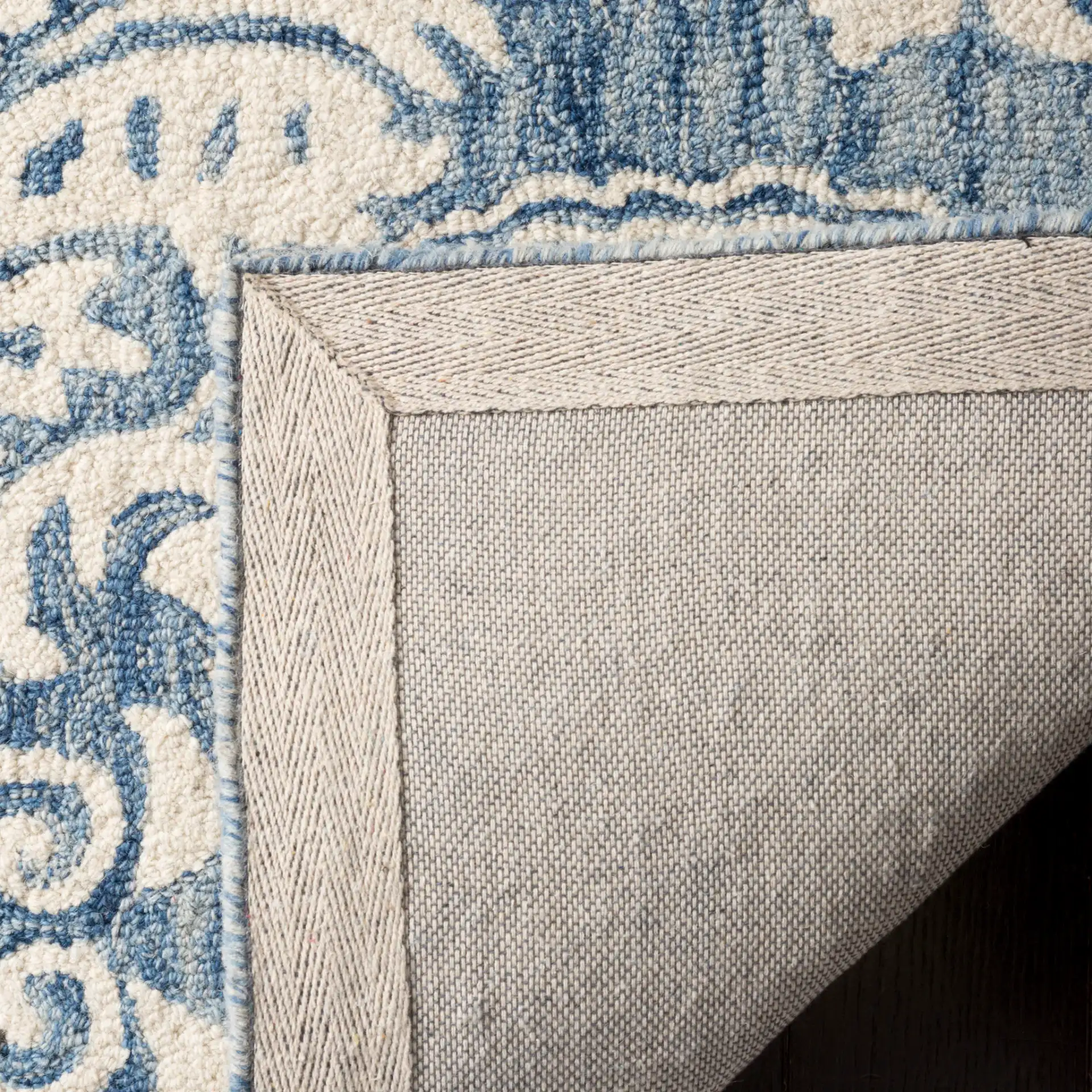 Micro-Loop Paisley Damask Hand-Tufted Wool Rug in Blue / Ivory in a styled room