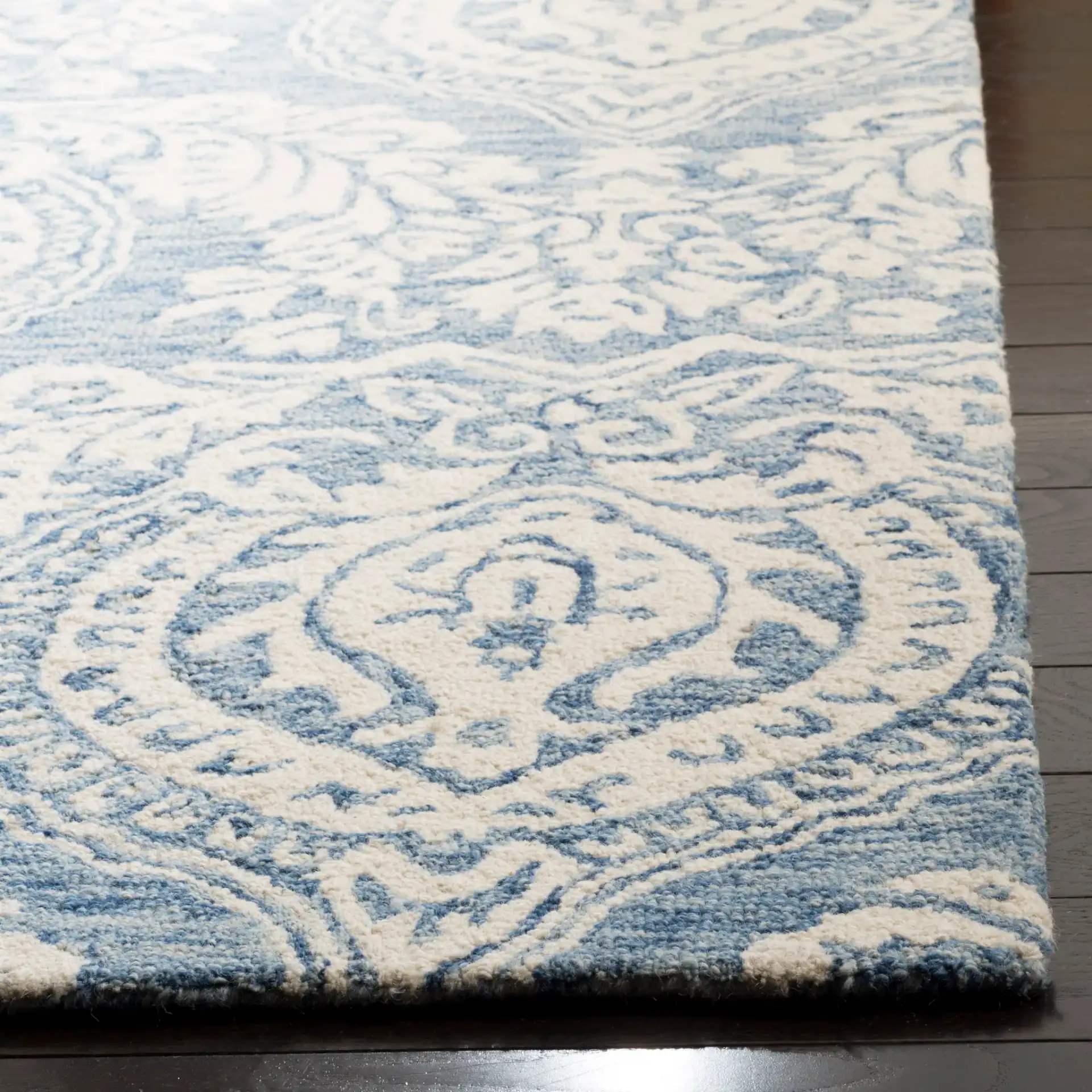 Micro-Loop Paisley Damask Hand-Tufted Wool Rug in Blue / Ivory in a styled room