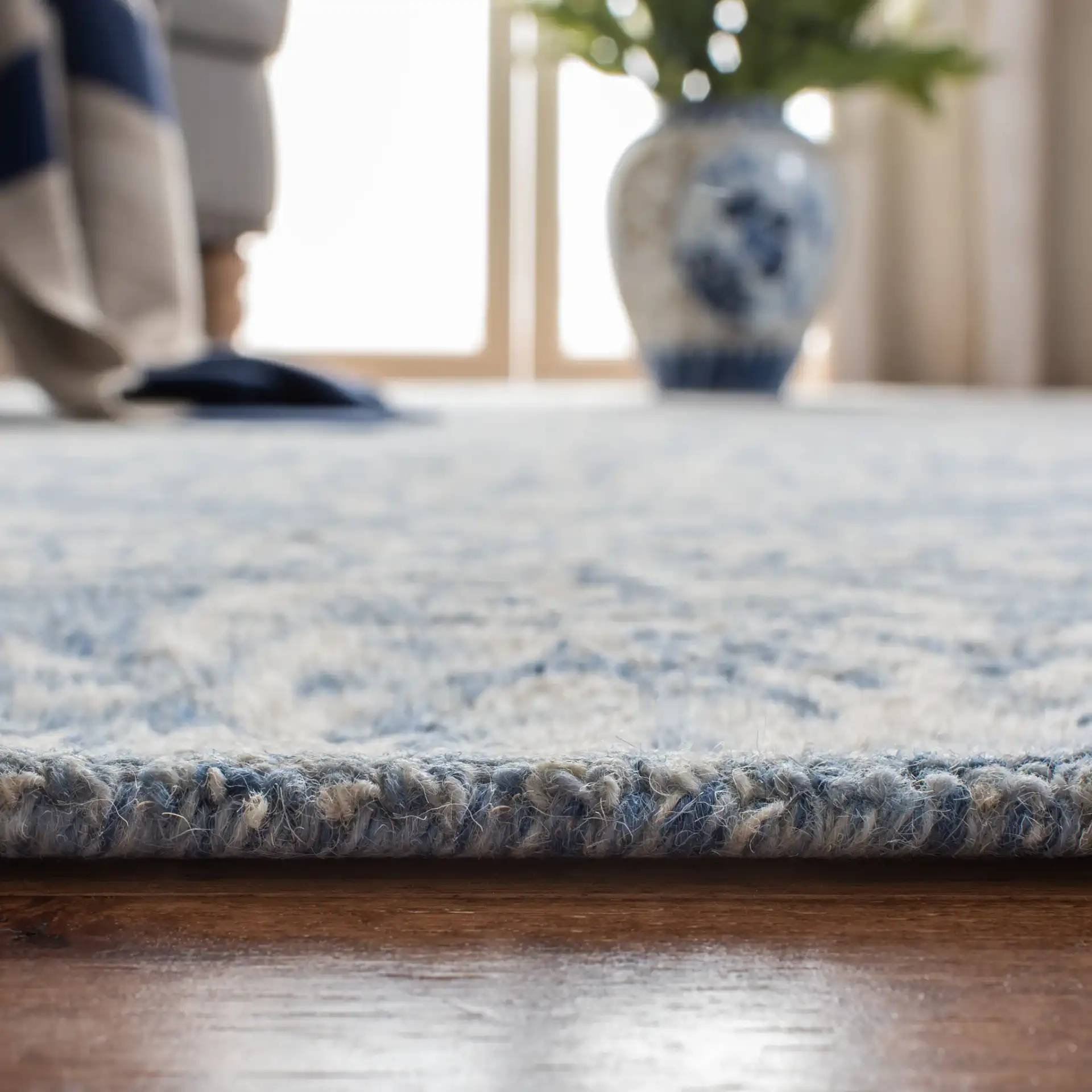 Micro-Loop Damask Tile Hand-Tufted Wool Rug in Blue / Ivory in a styled room
