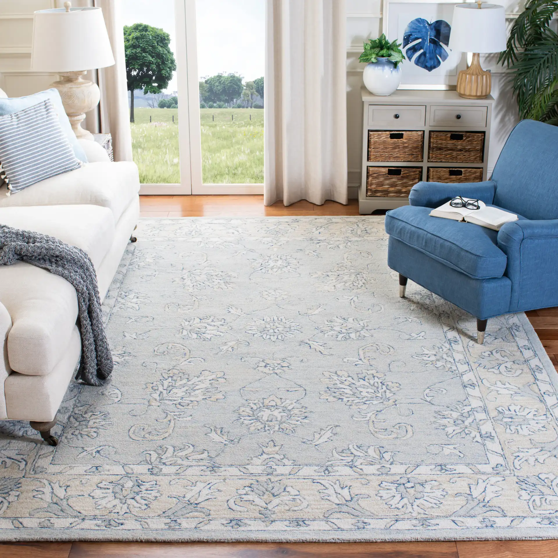 Micro-Loop Floral Border Hand-Tufted Wool Rug in Blue / Beige in a styled room