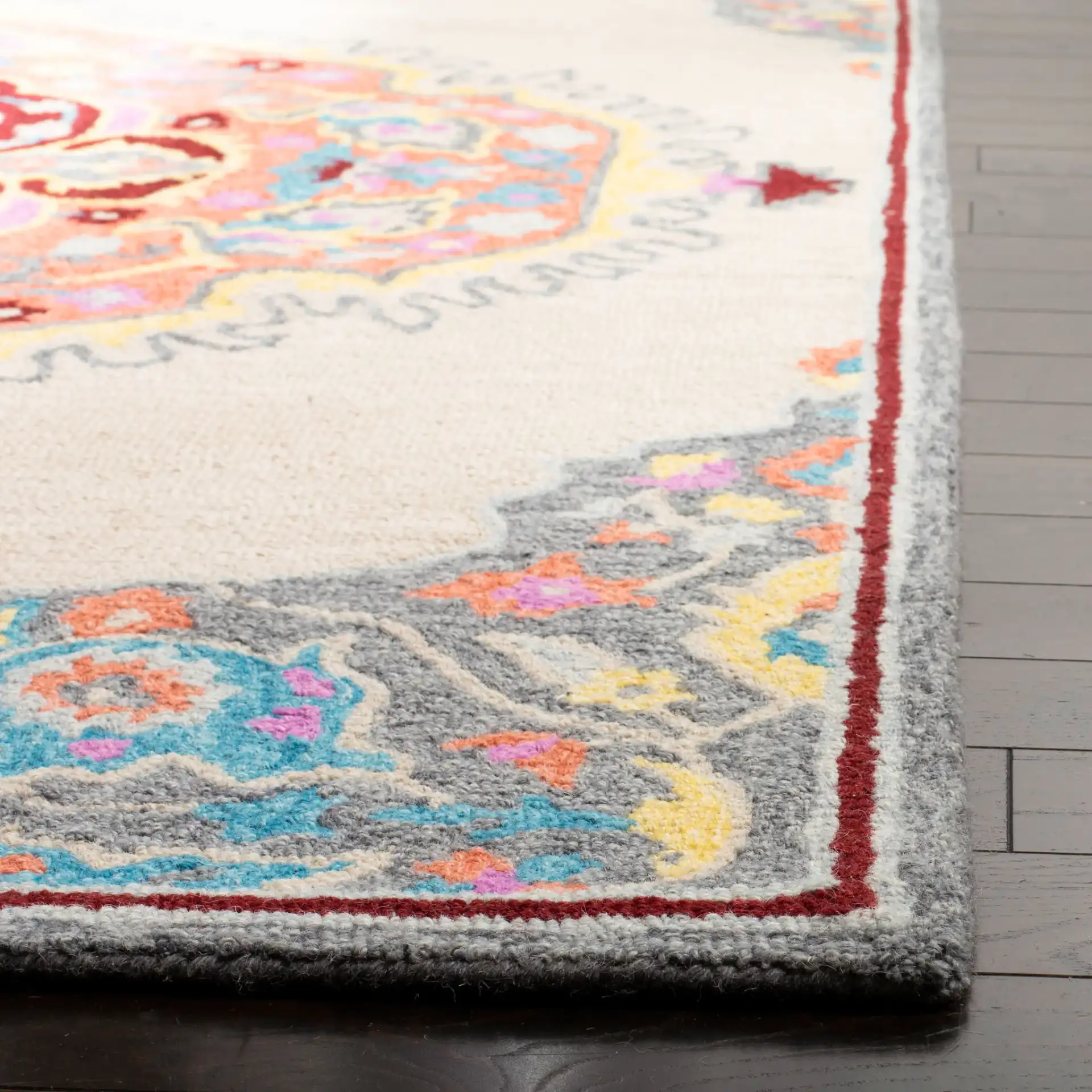 Micro-Loop Hexagon Medallion Hand-Tufted Wool Rug in Beige / Orange in a styled room