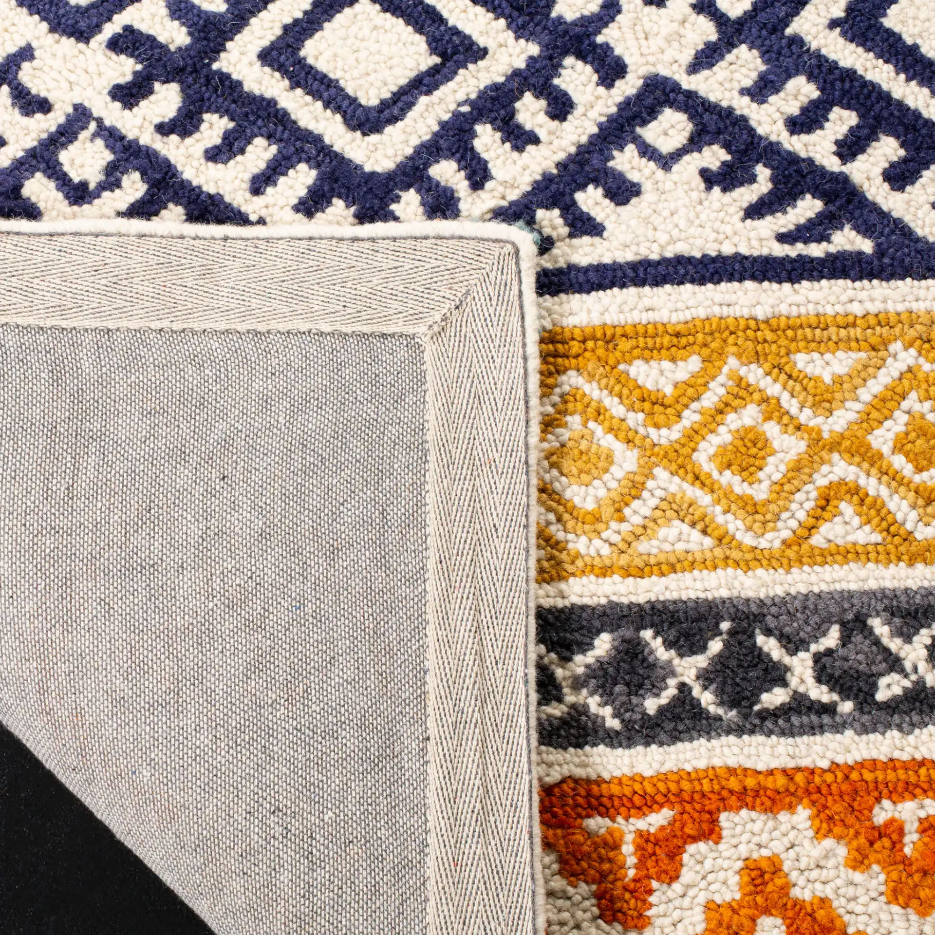 Micro-Loop Striped Tribal Hand-Tufted Wool Rug in Ivory / Rust in a styled room
