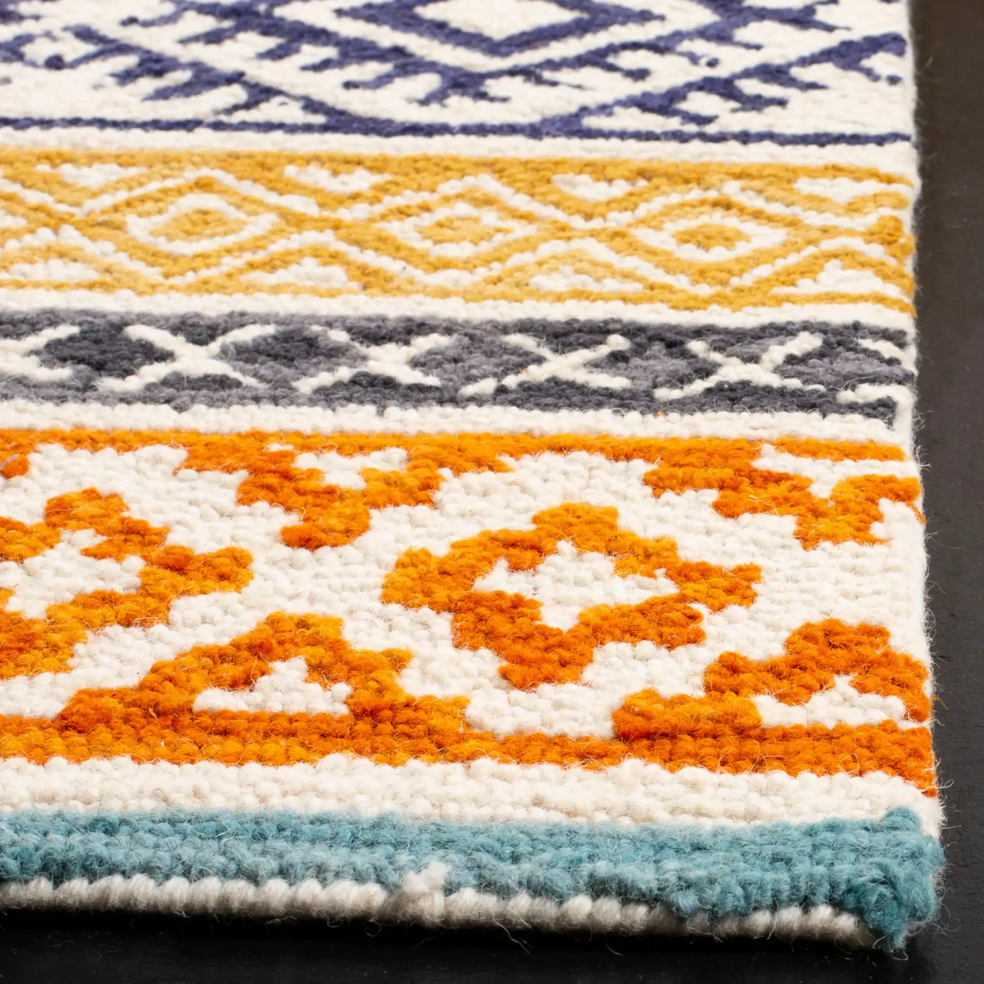 Micro-Loop Striped Tribal Hand-Tufted Wool Rug in Ivory / Rust in a styled room