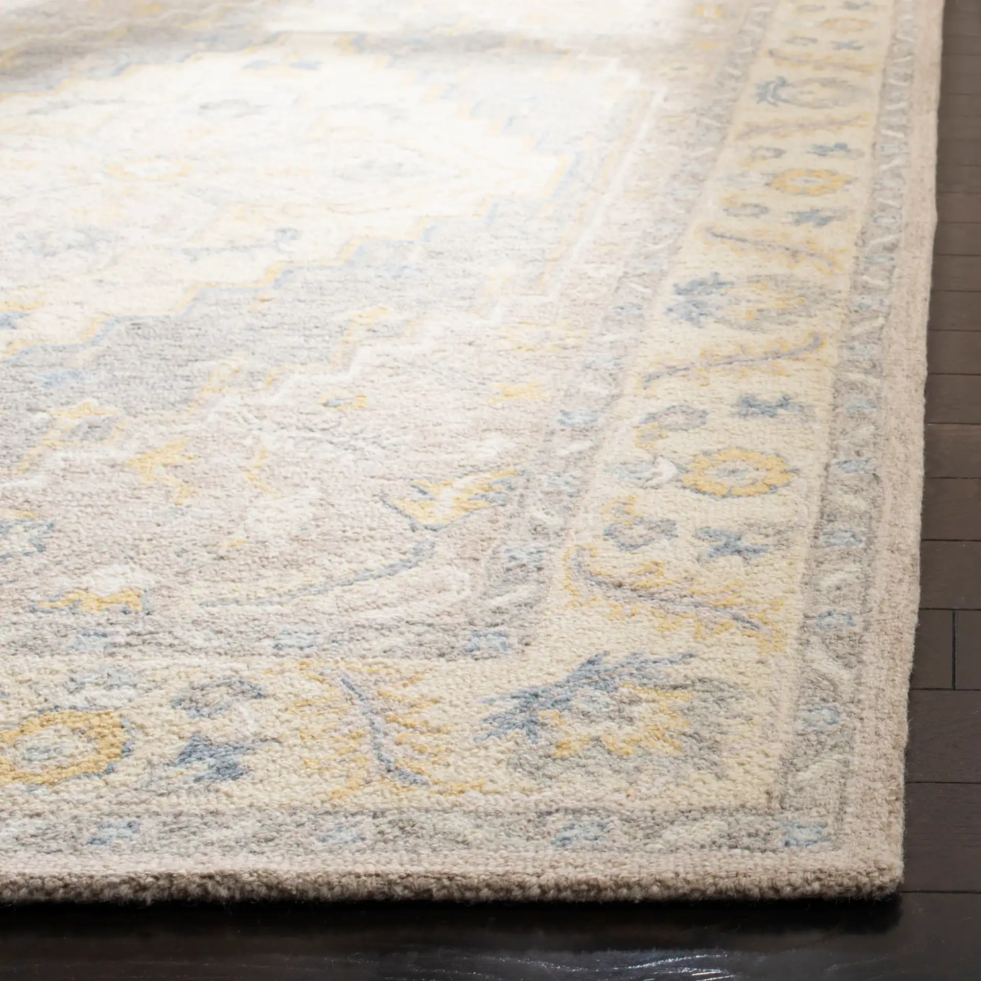 Micro-Loop Stepped Medallion Hand-Tufted Wool Rug in Beige / Gray in a styled room