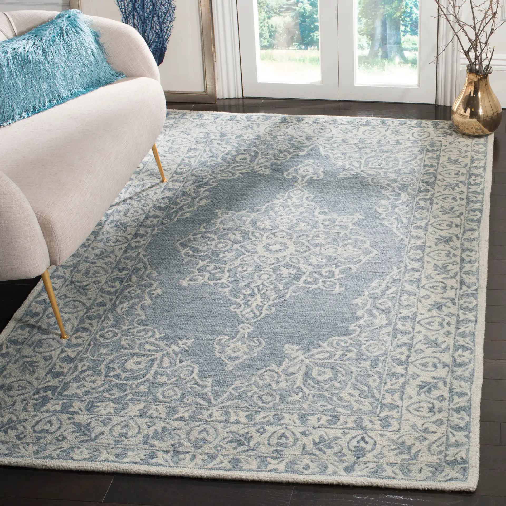 Micro-Loop Traditional Medallion Hand-Tufted Wool Rug in Blue / Light Blue in a styled room